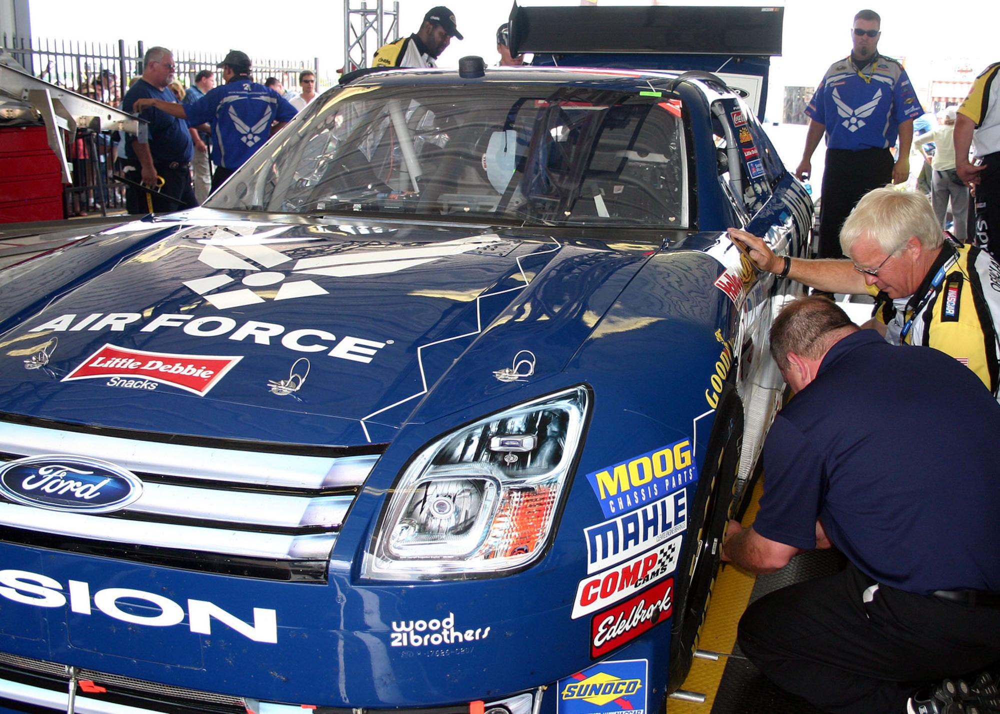 NASCAR officials inspect the No. 21 Air Force car prior to the Pocono 500 race June 8. Just as in the Air Force, safety is a top priority. (U.S. Air Force photo/ Dale Eckroth)