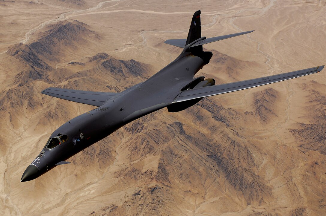 An Air Force B-1B Lancer aircraft moves out of position after receiving fuel from a KC-135R Stratotanker during a mission over Afghanistan. (U.S. Air Force photo/Master Sgt. Andy Dunaway) 
