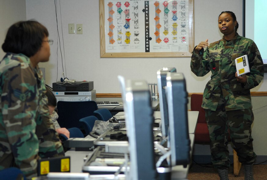 MINOT AIR FORCE BASE, N.D. – Senior Airman Danyette Williams, emergency management journeyman with the 5th Civil Engineer Readiness and Emergency Management Flight, gives detailed instructions on performing a preventive maintenance check inspection on an ADM-300 radiac meter here recently. The ADM-300 radiac meter detects radiation and is inspected bi-annually to ensure it functions properly. (U.S. Air Force photo by Staff Sgt. Thomas Dow)