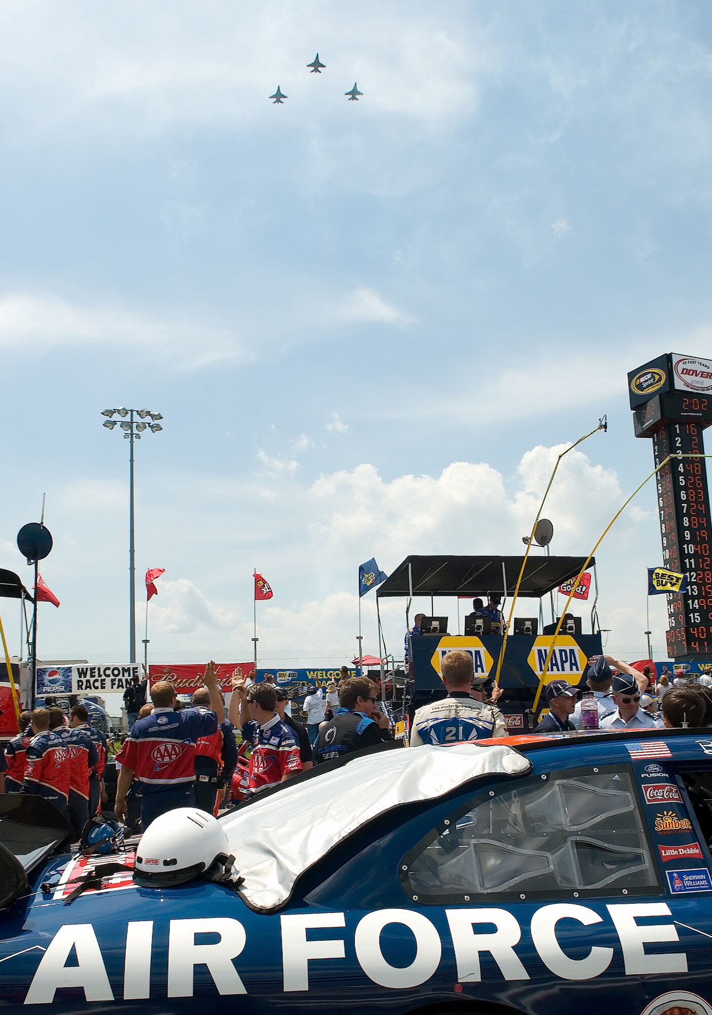 Three F-16 Fighting Falcons from the 149th Fighter Wing, Texas Air National Guard, perform a flyover of Dover Downs International Speedway before the start of the Best Buy 400 race June 1.  (U.S. Air Force Photo/Roland Balik)