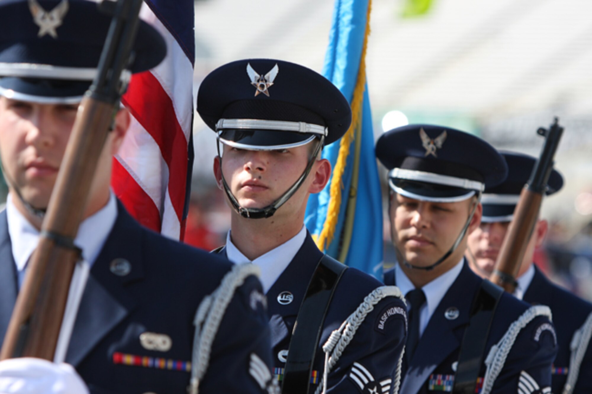 (From left) Senior Airman Rhett Taylor, 436th Maintenance Squadron; Senior Airman Bruno Carreiro, 436th Aerial Port Squadron; Staff Sergeant David Rodriguez, 736th Aircraft Maintenance Squadron; and Airman 1st Class Kyle Perman, 436th AMXS, march onto the stage to post the colors before the NASCAR Craftsman Truck Series race May 30 at Dover Downs International Speedway.  (U.S. Air Force Photo/Roland Balik)