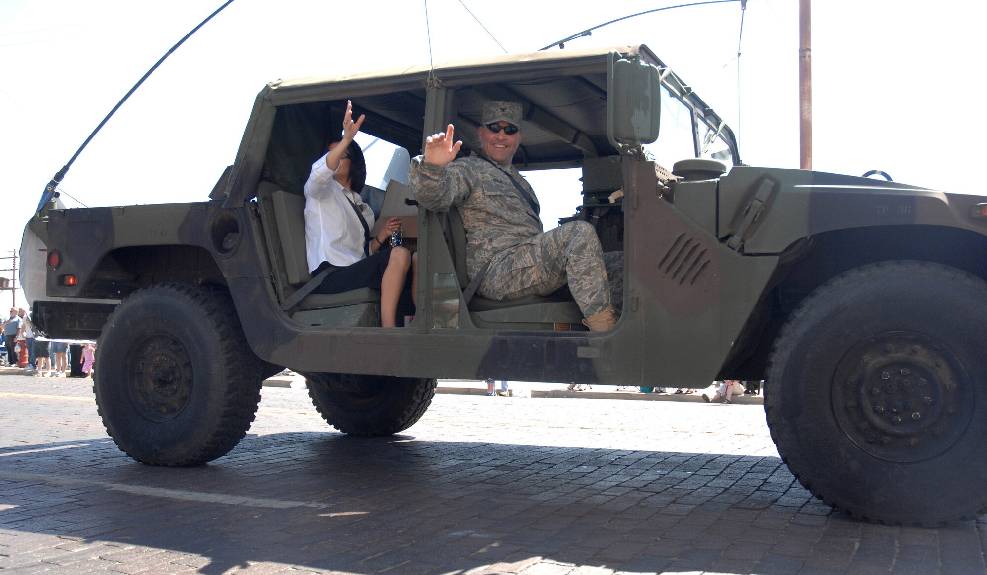 CANNON AIR FORCE BASE, N.M. -- Col. Timothy Leahy, 27th Special Operations Wing Commander, waves at the crowd during the 38th annual Pioneers Parade. The parade took place in downtown Clovis, N.M. on June 7. (U.S. Air Force photo/Airman 1st Class Evelyn Chavez) 