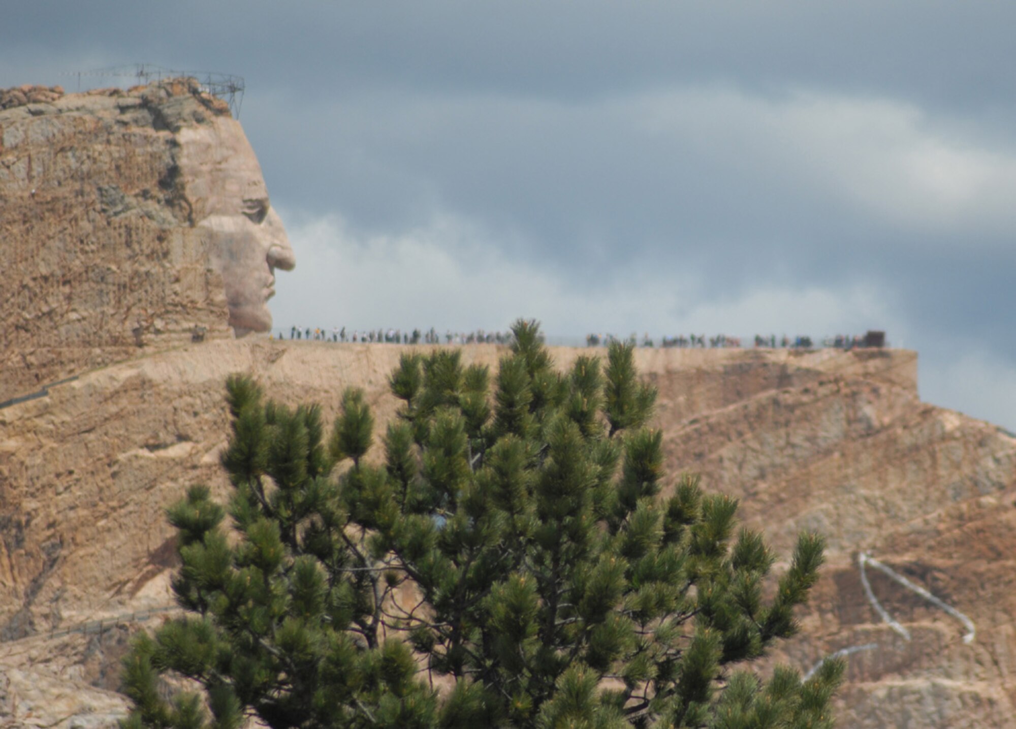 Thousands of Black Hills community members and tourists, including many from Ellsworth, trekked 6.2 miles June 7 and 8 to view the Crazy Horse monument up close. The annual Crazy Horse Volksmarch is the only time each year the public may walk to the mountain carving; it is one way Ellsworth members discovered the hills so far this summer. (U.S. Air Force Photo/Lt. Lauren Wright)