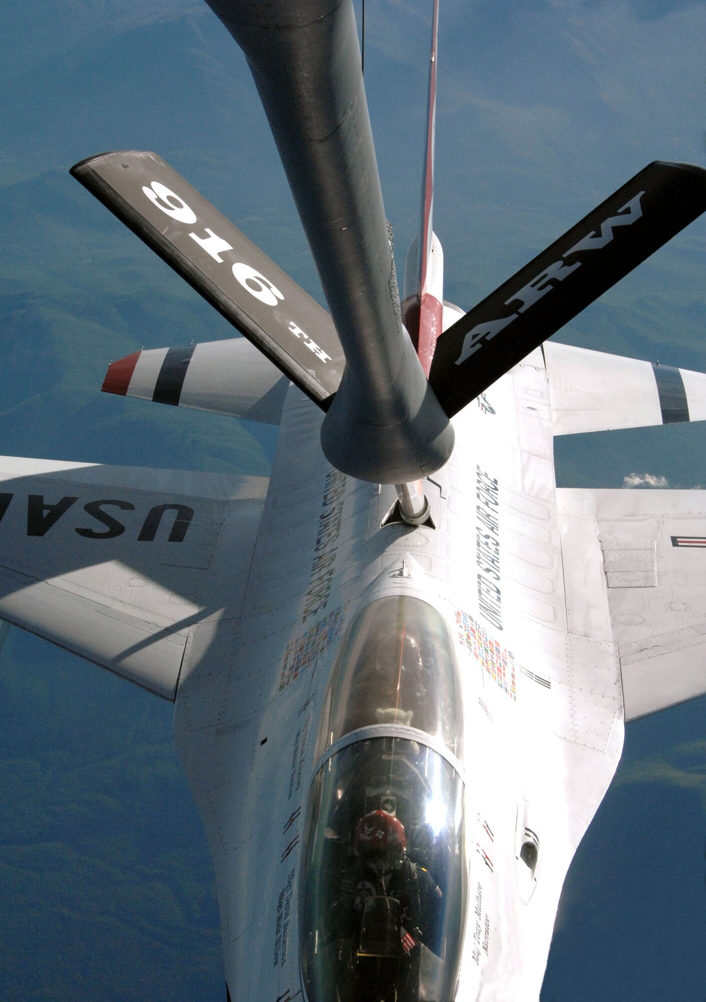 SEYMOUR JOHNSON AIR FORCE BASE, N.C. -- A KC-135 tanker from the 916th Air Refueling Wing, Seymour Johnson AFB, N.C., refuels an F-16 from the U.S. Air Force demonstration team, the Thunderbirds, over Burlington, Vermont June 8.  (U.S. Air Force photo by TSgt. Gillian M. Albro, 916th ARW/PA)