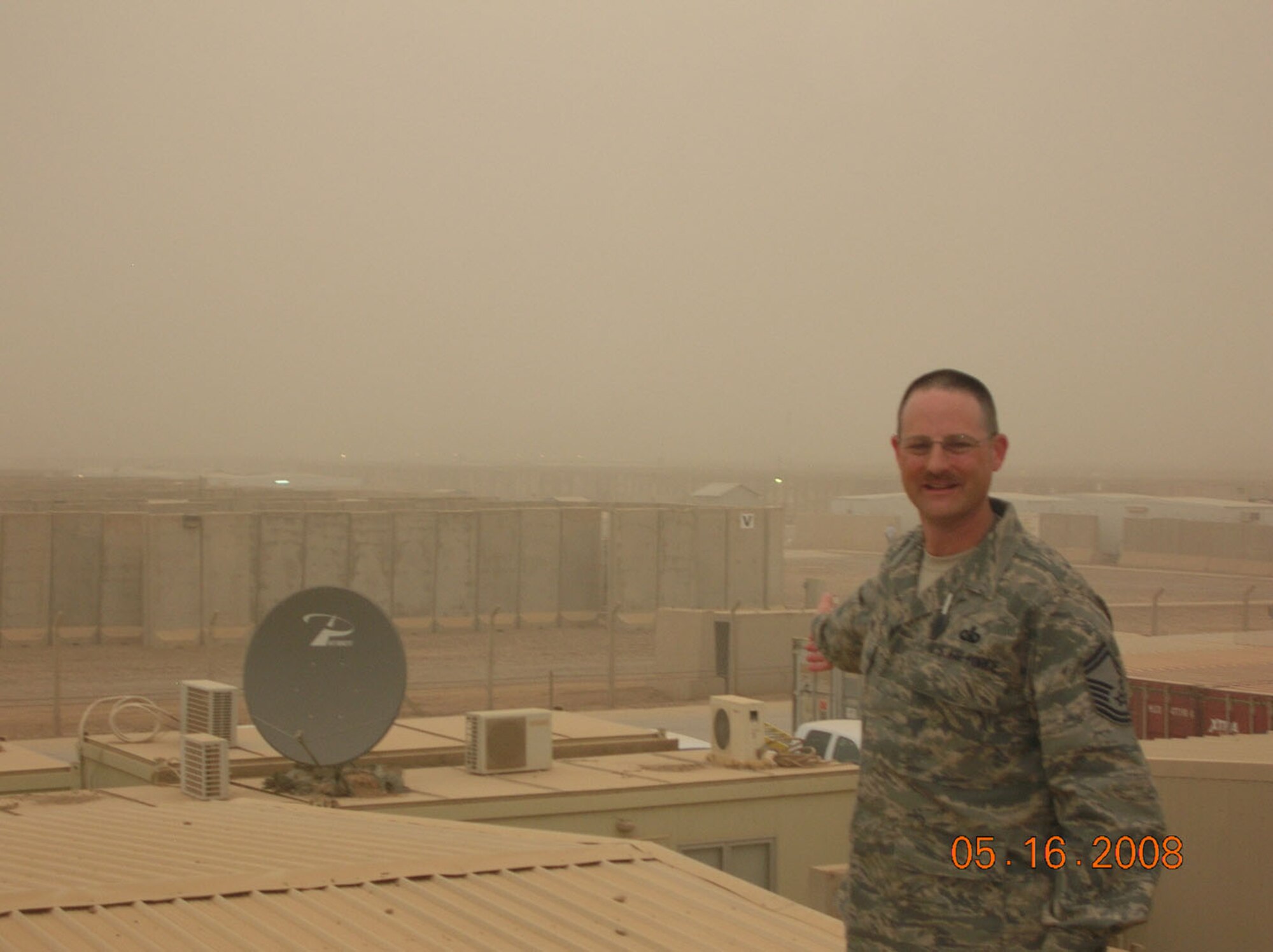 SEYMOUR JOHNSON AIR FORCE BASE, N.C. -- Senior Master Sgt. Bryan Payne, a communications superintendent with the 916th Communications Squadron, shows what difference a few hours can make in visibility in Iraq.