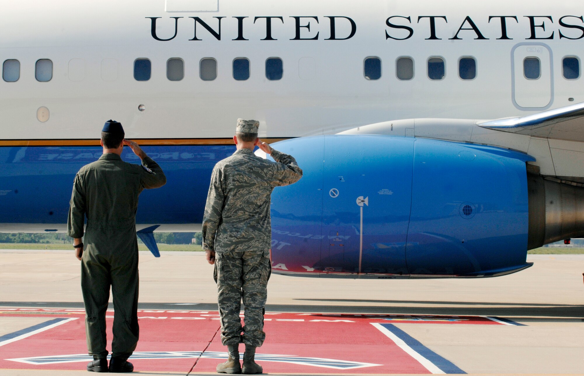 LANGLEY AIR FORCE BASE, Va. -- Col. Jeffrey Prichard,1st Fighter Wing vice commander (left), and Gen. John D.W. Corley (right), commander of Air Combat Command, salute U.S. Secretary of Defense Robert Gates during his departure from Langley June 9.  Secretary Gates visited Langley to discuss leadership transitions with Airmen.  (U.S. Air Force photo/Senior Airman Vernon Young)