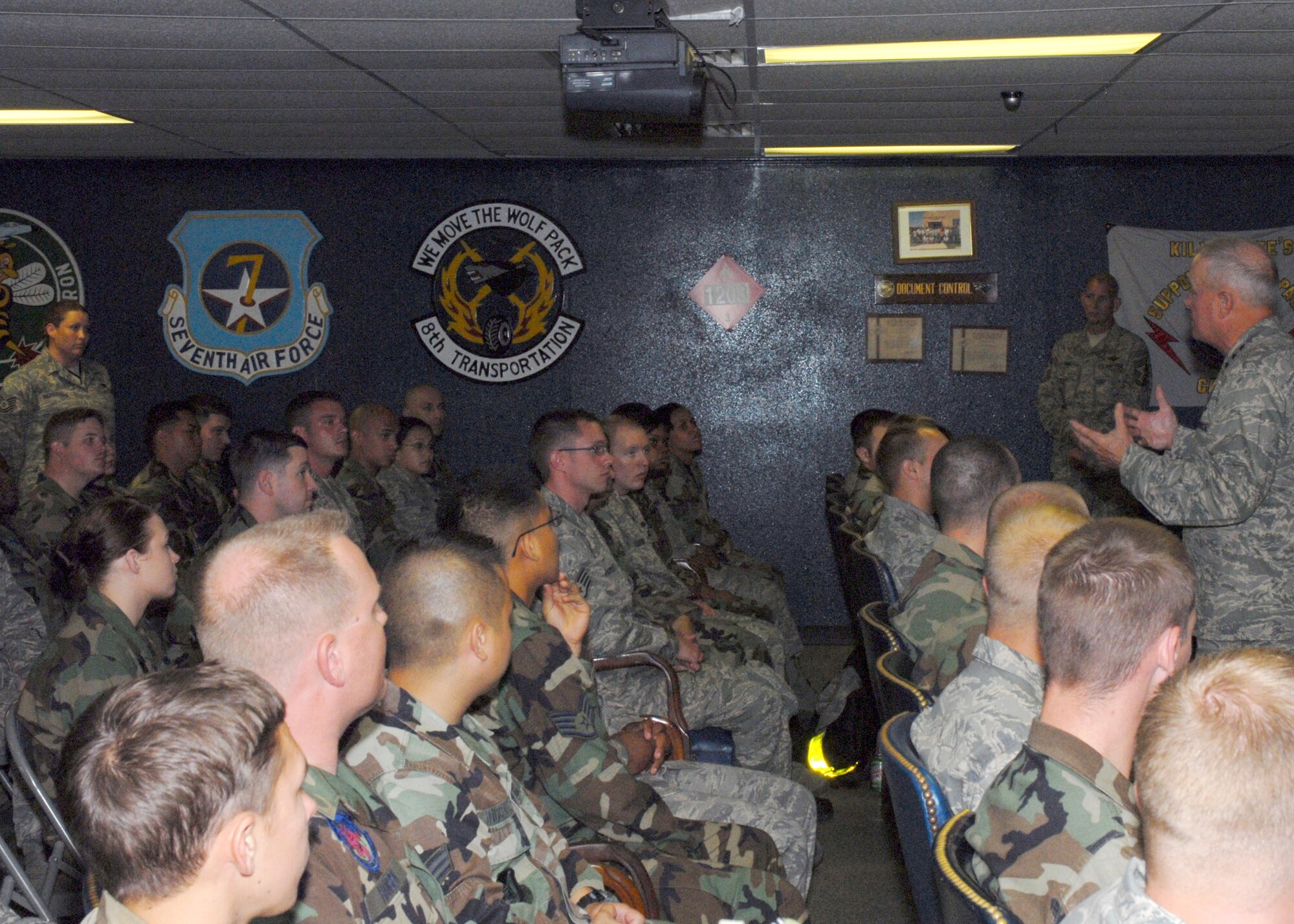 KUNSAN AIR BASE, Republic of Korea— Lieutenant General Stephen G. Wood, 7th Air Force commander answers a question about funding from Tech. Sgt. April Richardson,  35th Aircraft Maintenance Unit Support Section here June 10. General Wood visited the Wolf Pack to discuss the changes in Air Force leadership; answer questions and concerns Airmen had and to discuss the importance of communication between supervisors and Airmen. (U.S. Air Force Photo/Staff Sgt Araceli Alarcon) 