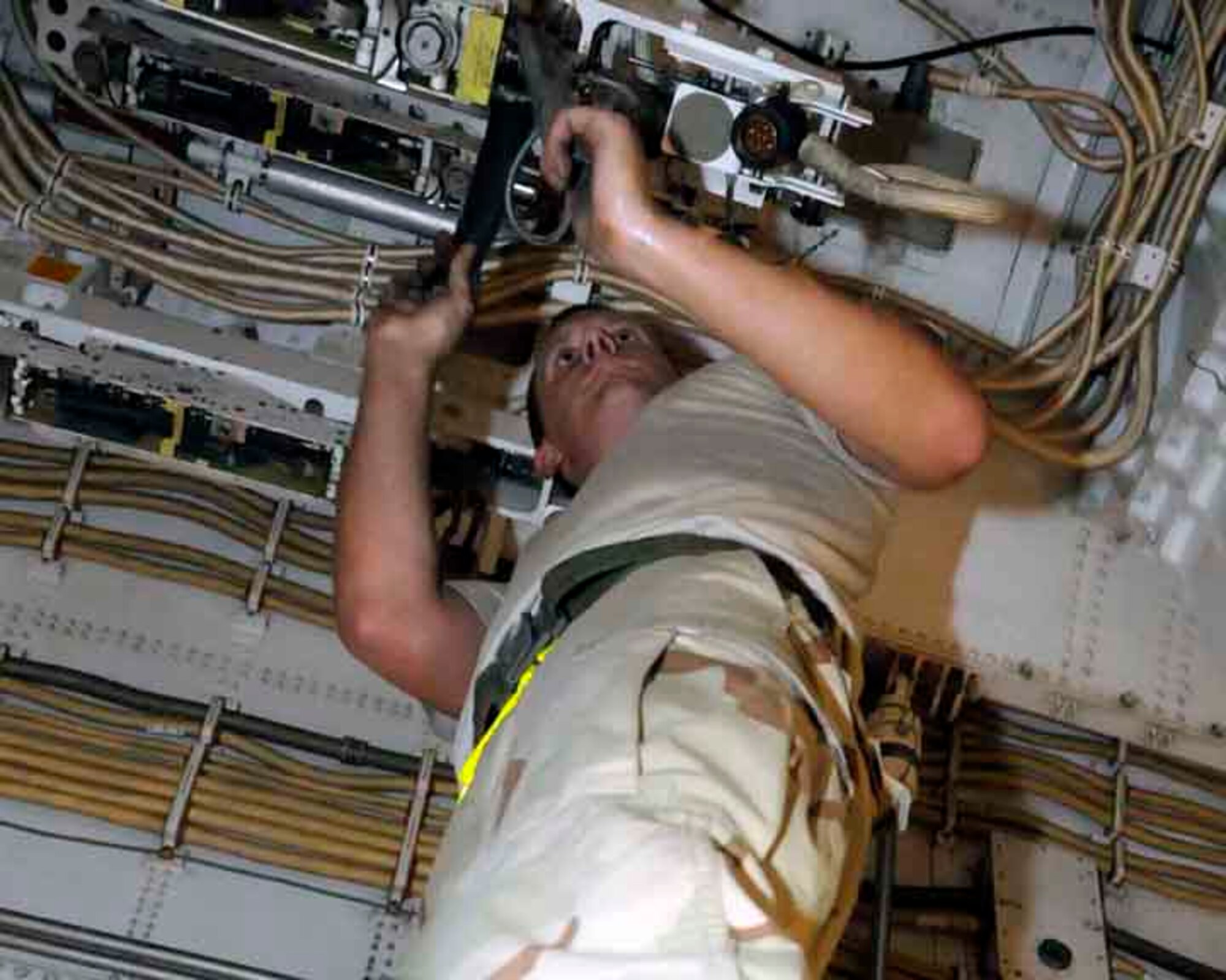 SOUTHWEST ASIA—Senior Airman Isaac Loren preps a bomb mod for loading May 29. Airman Loren is assigned to the 37th Aircraft Maintenance Unit and works noon to midnight. The B-1 maintainers work around the clock to keep the aircraft flying. (U.S. Air Force photo/ Senior Airman Domonique Simmons)