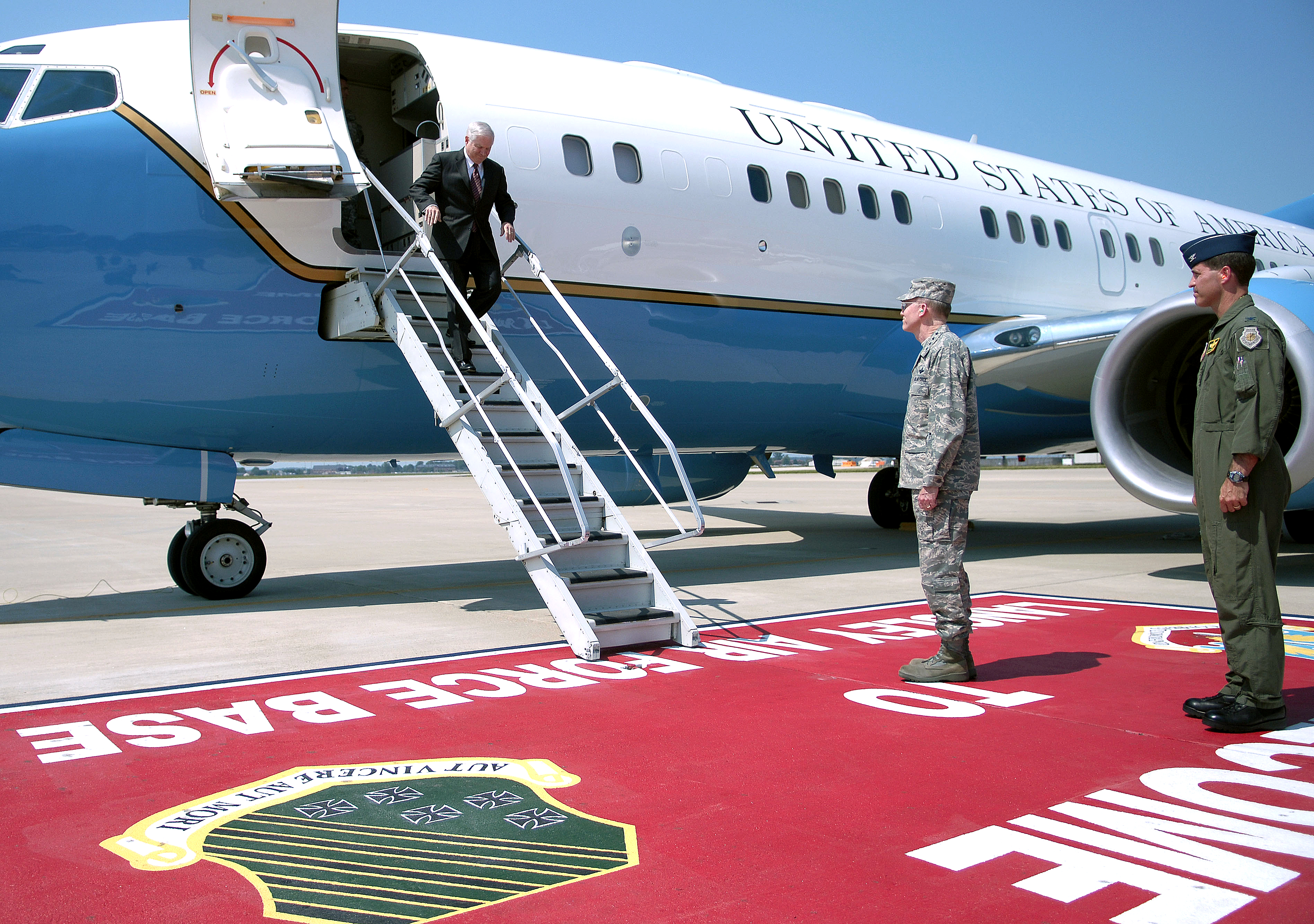 U.S. Defense Secretary Robert M. Gates is greeted by Gen. John