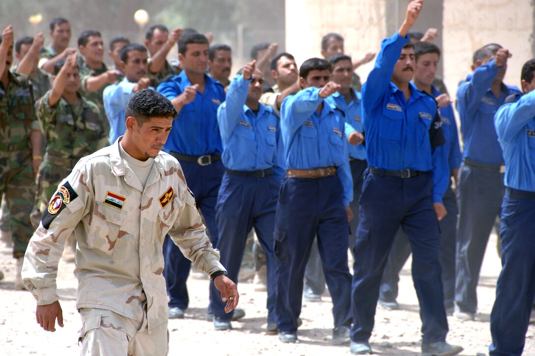 Students of the Iraqi Police Scorpion Academy march to their graduation on Forward Operating Base Fallock, Iraq, June 07, 2008. 