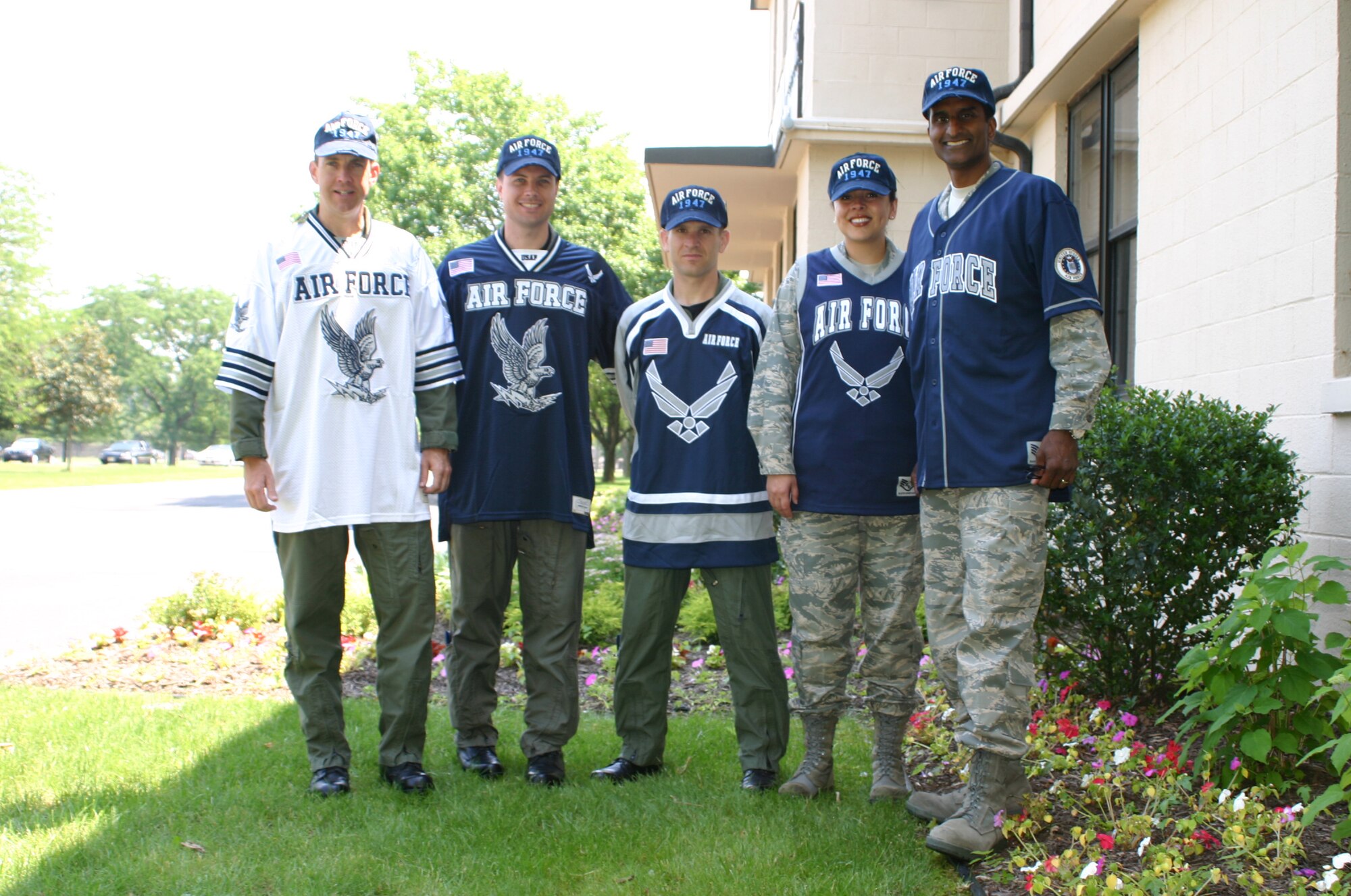 Col. Balan Ayyar, 305th Air Mobility Wing commander, and his executive staff model Air Force jerseys and baseball caps available for purchase through the wing booster club. This limited-time event will raise money to support our Airmen by reducing cost for various installation events such as military balls, dining ins and dining outs. The shirts, which retail up to $85, are available for $45 each and the hats are $15. Call the wing command section at (609) 754-3052 to purchase yours before they are sold out. Call before June 20 and tell them you saw it in the Warrior Spirit to receive $5 off the cost of your jersey. (U.S. Air Force photo/Capt. Anthony Duggan)