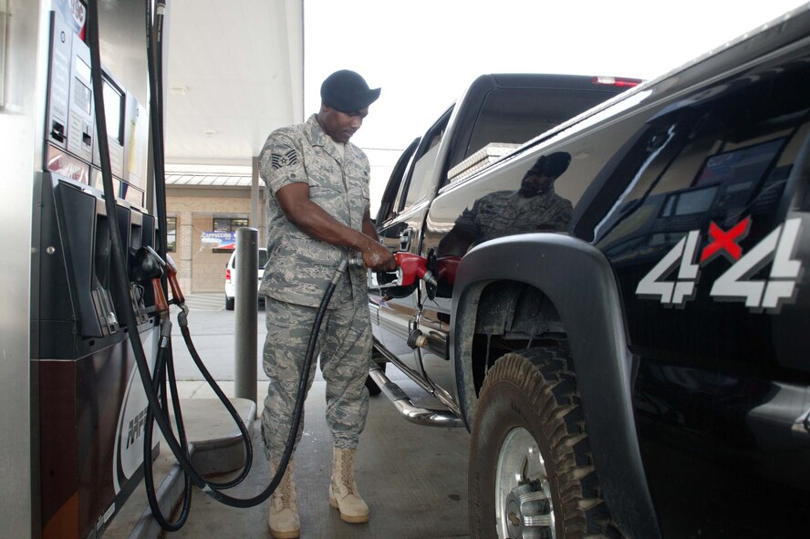 SHAW AIR FORCE BASE, S.C. -- Tech. Sgt. Jemal Jones, 20th Security Forces Squadron K-9 section kennel master, fills up his truck at the shoppette June 11. Soaring gas prices are affecting Airmen's budgets. Sergeant Jones said he and his family had to cut back on their entertainment spending to make up for the cost of fuel. (U.S. Air Force photo/Staff Sgt. John Gordinier)