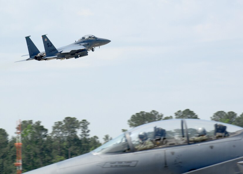 SEYMOUR JOHNSON AIR FORCE BASE, N.C. - An F-15E Strike Eagle from the 335th Fighter Squadron takes off here May 21. The F-15E Strike Eagle is the Air Force's dual role fighter and is the 4th Fighter Wing's premier aircraft. (U.S. Air Force photo by Airman 1st Class Rae A. Henline) 