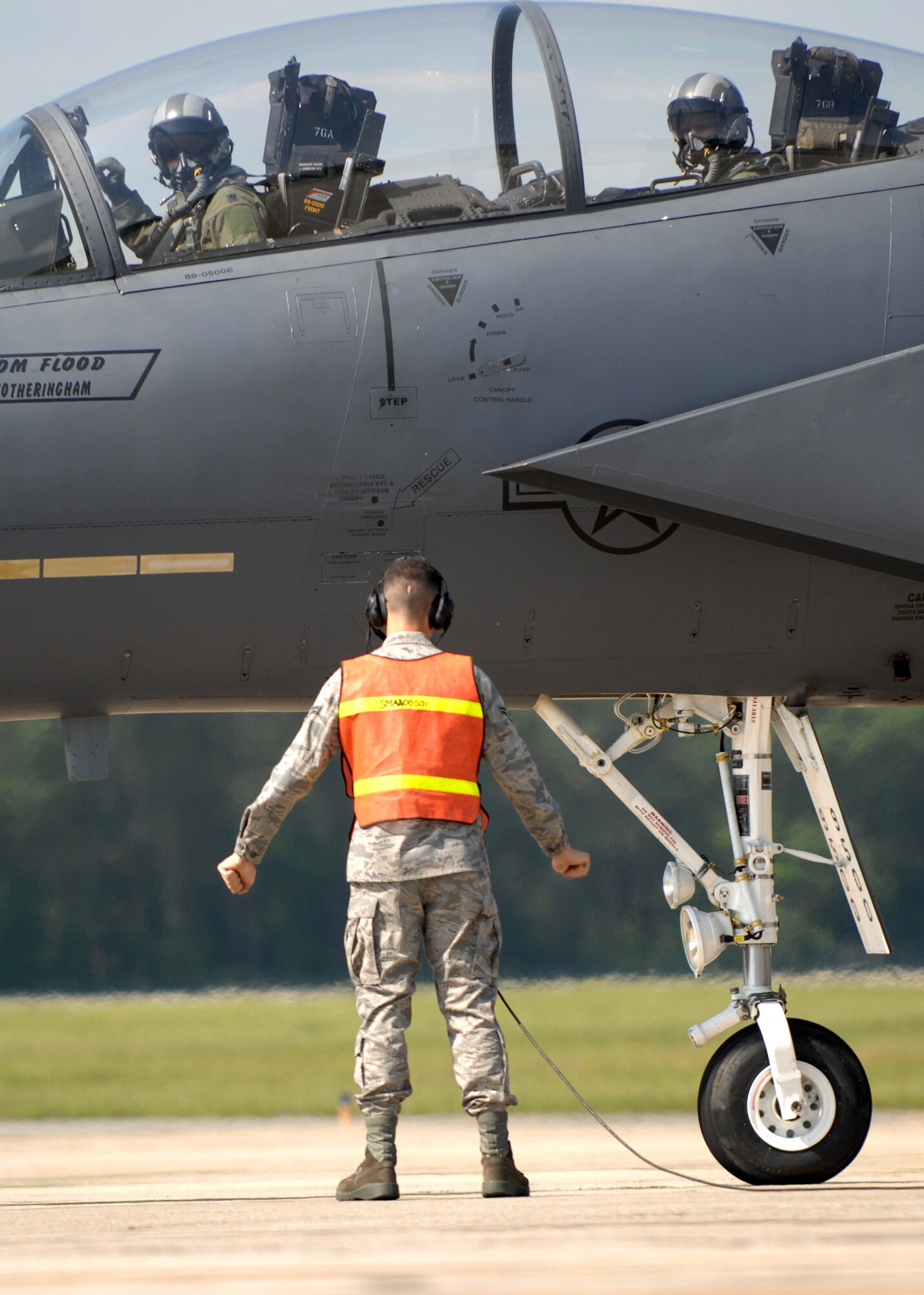 Airman 1st Class Fabian Hermosillo, 335th Aircraft Maintanance Unit, martials in an F-15E Strike Eagle at the End of Runway, Seymour Johnson AFB, May 21, 2008.  The EOR is the final stop for inspection before these jets take off. (U.S. Air Force photo by Airman 1st Class Rae A. Henline)