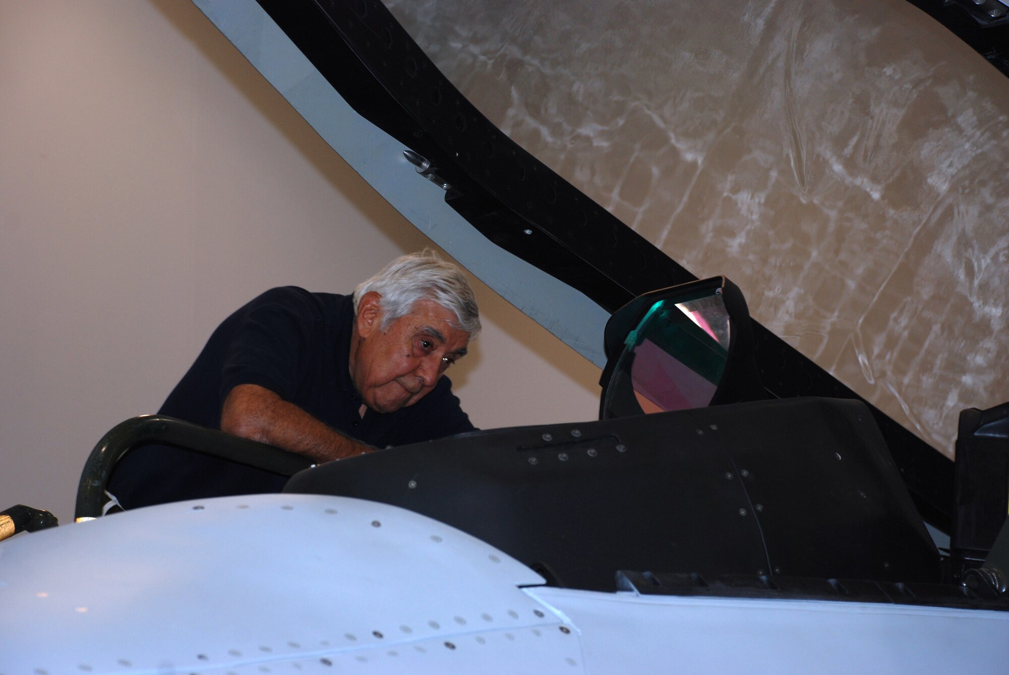 Lt. Gen. Leo Marquez, former deputy chief of staff for logistics and engineering, takes a look at the F-22 Raptor during a tour June 3-5. (U.S. Air Force photo/Airman 1st Class Jacob Corbin) 