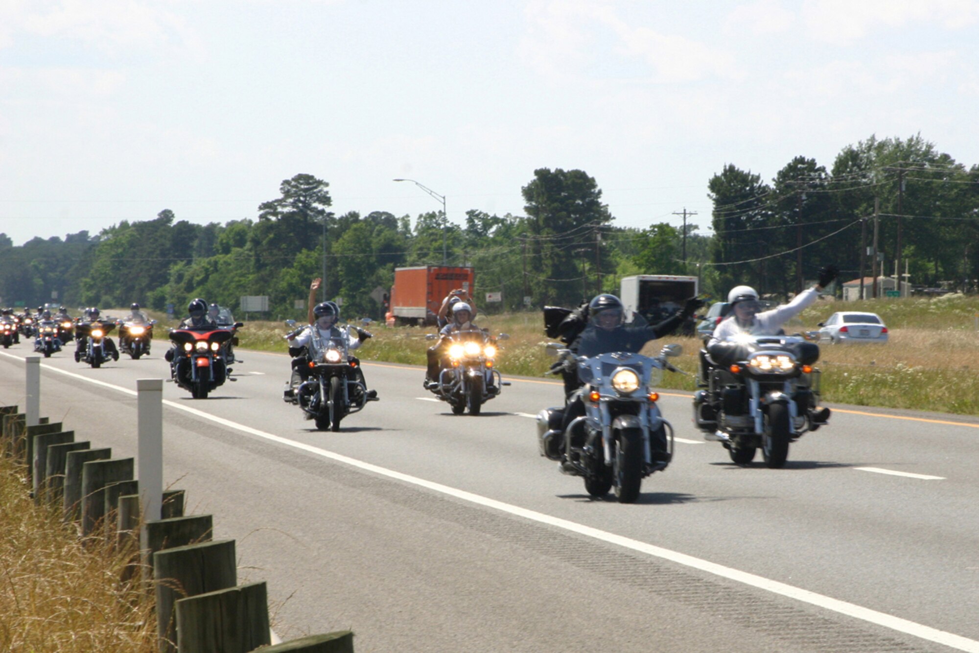 Almost 300 participants in Run For The Wall 2008 roll down Interstate 20 in Waskom, Texas, Sunday, May 18, 2008, on their way to the Vietnam Veterans Memorial in Washington D.C., urged on by the waves and shouts of hundreds of supports who lined overpasses and embankments from Waskom through Bossier City, La. Members of the Barksdale Freedom Riders were on hand to lend their support to the cause. (U.S. Air Force photo/Tech. Sgt. Jeff Walston)