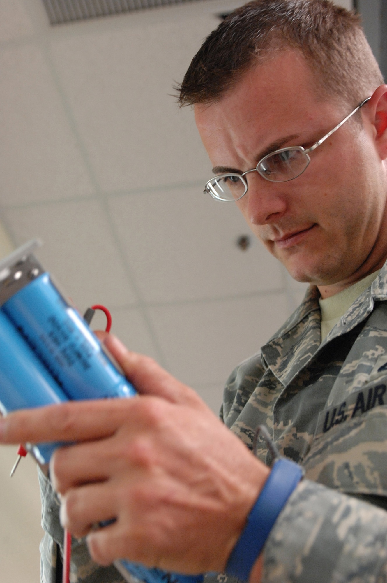 LANGLEY AIR FORCE BASE, Va. -- Tech. Sgt. Eric Bennett troubleshoots a power supply at the Air Force Repair Enhancement Program shop June 3. “If it's broke, we can fix it,” is the motto of AFREP, a general purpose repair shop that works on aircraft parts and miscellaneous devices. Sergeant Bennett, 1st Maintenance Group, is the assistant AFREP manager. (U.S. Air Force photo/Senior Airman Barry Loo)


