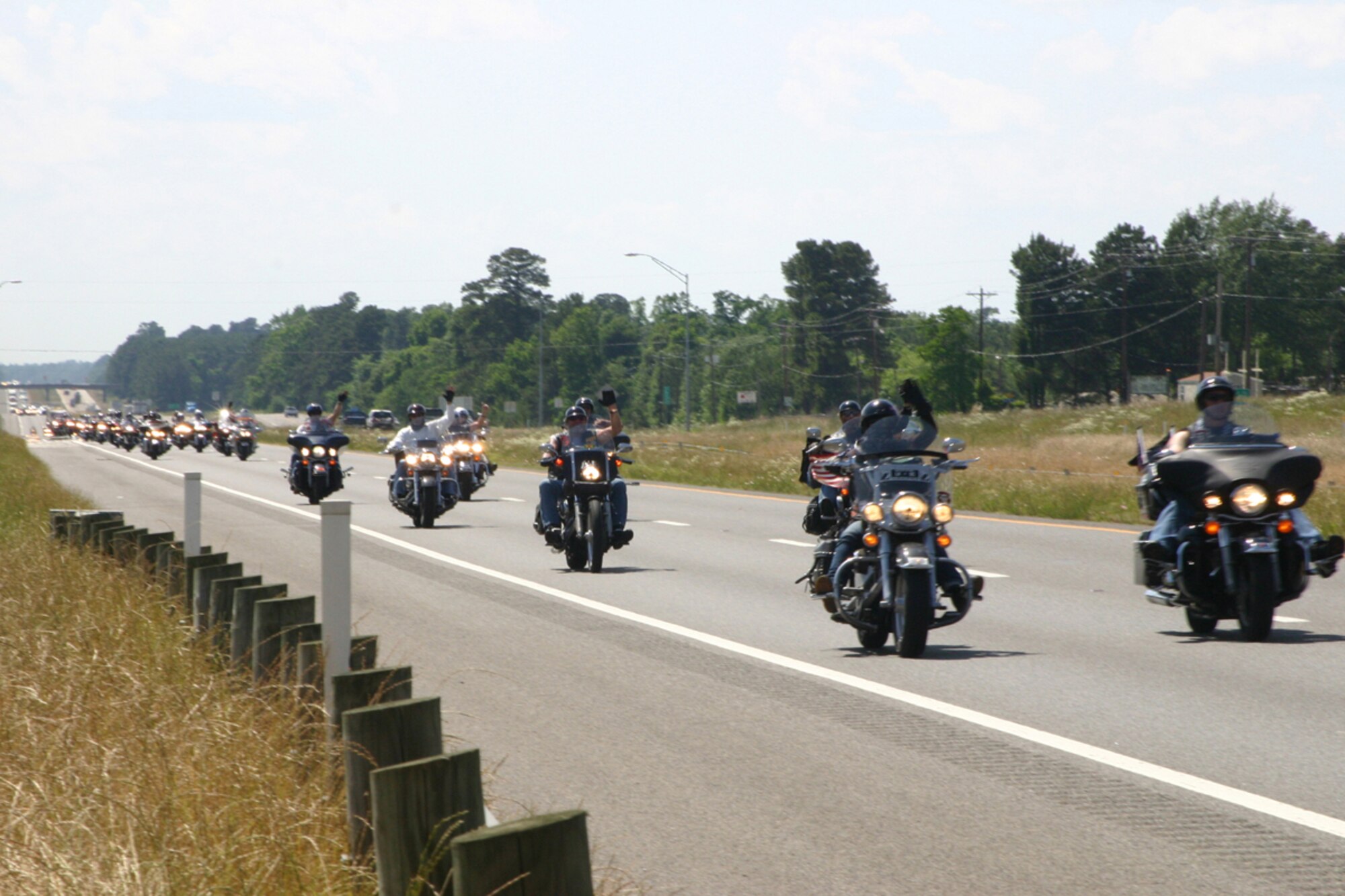 Almost 300 participants in Run For The Wall 2008 roll down Interstate 20 in Waskom, Texas, Sunday, May 18, 2008, on their way to the Vietnam Veterans Memorial in Washington D.C., urged on by waves and shouts from hundreds of supports who lined overpasses and embankments from Waskom, through Bossier City, La. Members of the Barksdale Freedom Riders were on hand to lend their support to the cause. (U.S. Air Force photo/Tech. Sgt. Jeff Walston)
