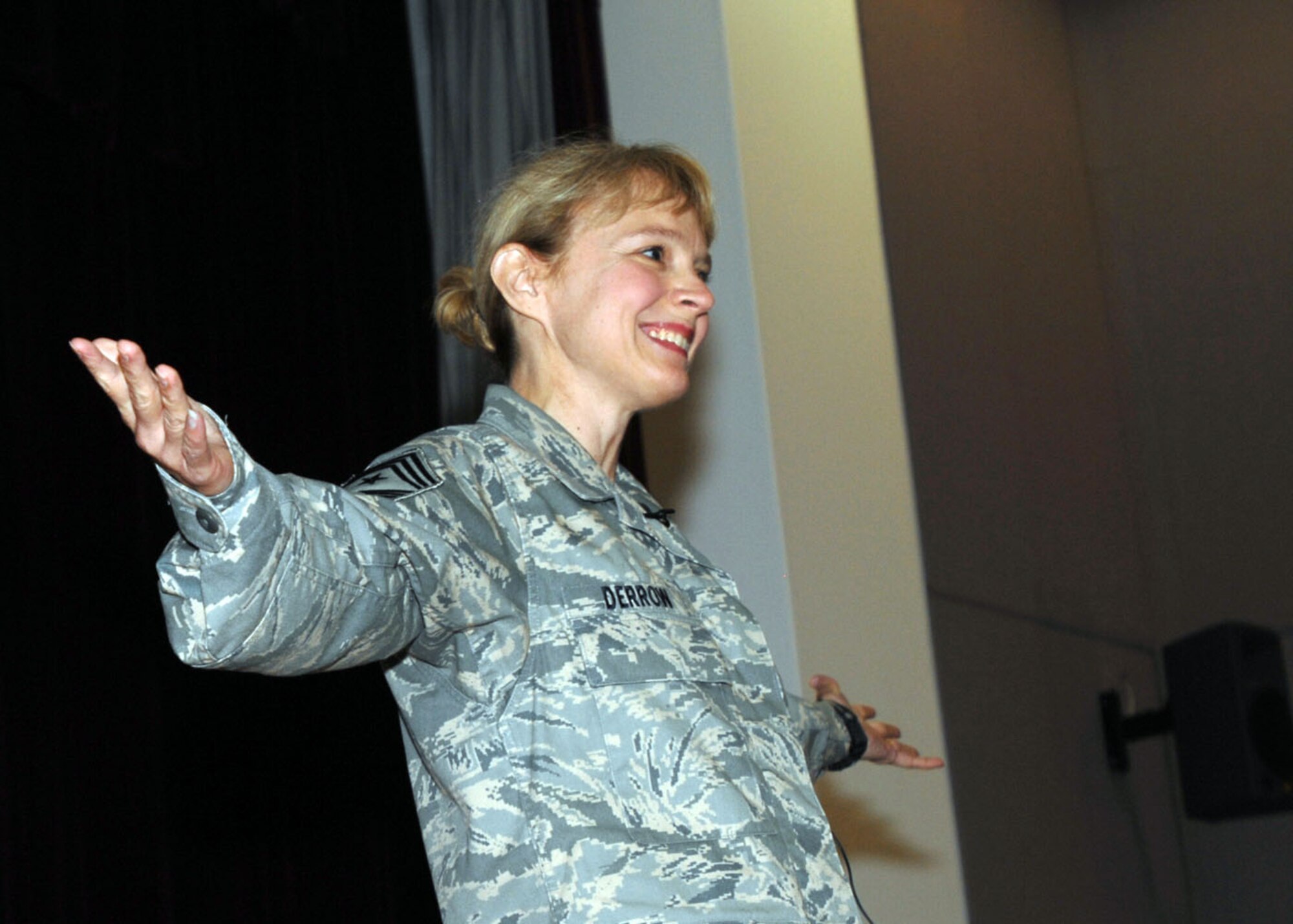 Chief Master Sergeant Pamela A. Derrow, Command Chief Master Sergeant of United States Air Forces in Europe, is greeted by Airmen at an enlisted all call at the base theater June 3. The former 100th Communications Squadron Information Systems Flight superintendent acted as the interim Command Chief Master Sergeant of the 100th Air Refueling Wing here from Dec. 2002 to July 2003. During her visit to RAF Mildenhall, Chief Derrow visited the Air Force Smart Operations for the 21st Century Office and the 100th Communications Squadron. (U.S. Air Force photo by Master Sgt. Sarah Frankenhoff)