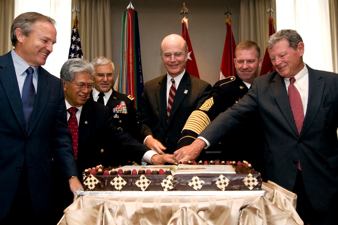 (From left to right) U.S. Rep. Chet Edwards of Texas, Sen. Daniel Akaka of Hawaii, Chief of Staff of the Army Gen. George Casey, Secretary of the Army Pete Geren, Sgt. Maj. of the Army Kenneth Preston and Sen. James Inhofe of Oklahoma ceremoniously cut the Army's birthday cake on Capitol Hill in Washington, June 10, 2008.