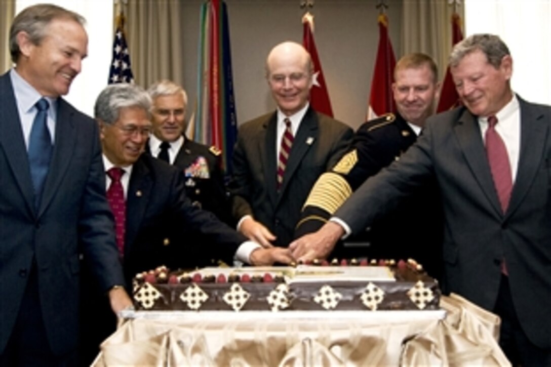 From left to right, U.S. Rep. Chet Edwards of Texas, Sen. Daniel Akaka of Hawaii, Chief of Staff of the Army Gen. George Casey, Secretary of the Army Pete Geren, Sgt. Maj. of the Army Kenneth Preston and Sen. James Inhofe of Oklahoma ceremoniously cut the Army's birthday cake on Capitol Hill, Washington, D.C., June 10, 2008. The U.S. Army's 233rd birthday commemorates the service of America's soldiers, families and civilians here and abroad.  