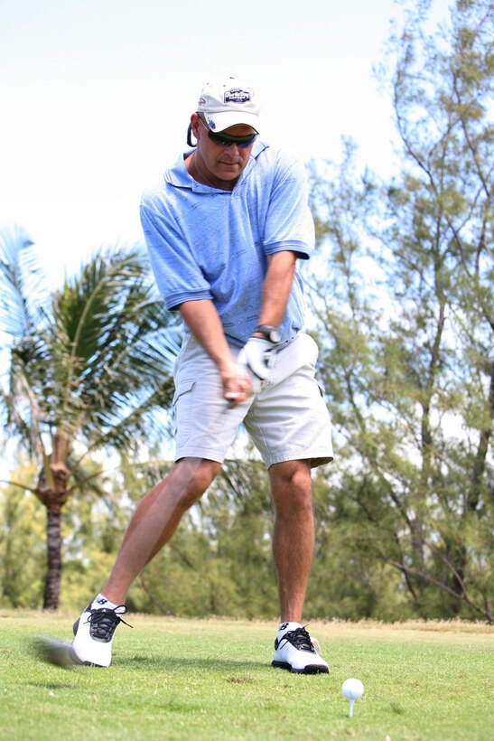 Ernest Shifflet tees off at the 7th hole during the Single Marine and Sailor Program’s Shank and Slice golf tournament at Kaneohe Klipper Golf Course here, June 12.