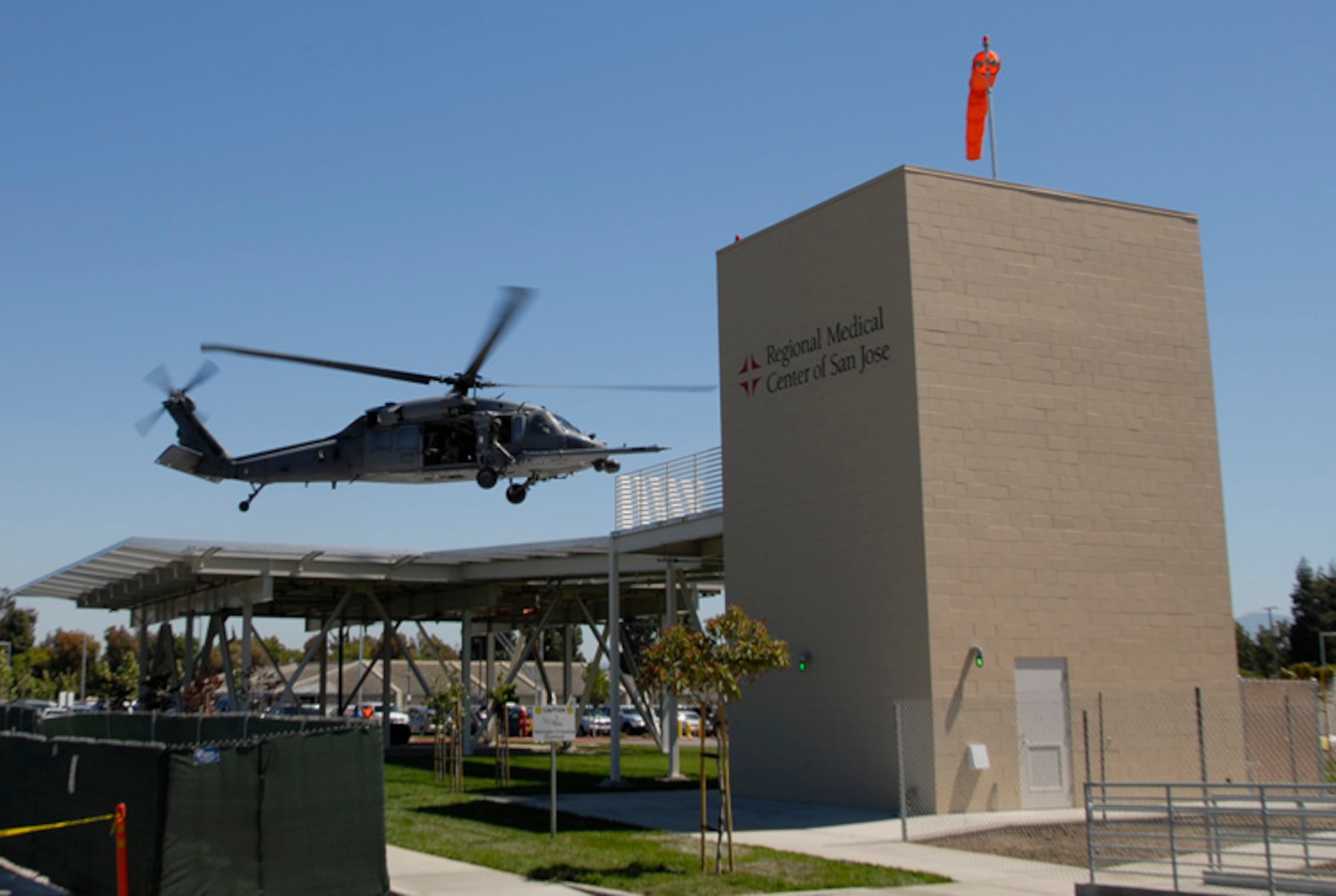 An HH-60G Pave Hawk from the 129th Rescue Wing, Moffett Federal Airfield, California hovers at the new helipad at the San Jose Regional Medical Center on June 9, 2008.  The pad has been constructed to withstand the weight of the Pave Hawk. (U.S. Air Force photo by Staff Sgt. Andrew Hughan)