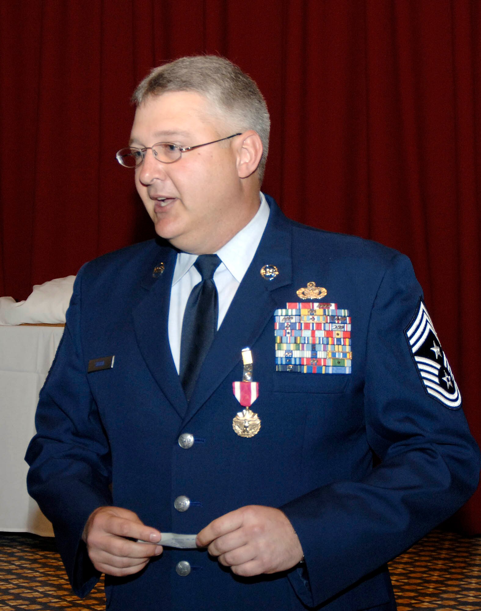 FAIRCHILD AIR FORCE BASE, Wash. – Chief Master Sgt. Paul Sikora, retired 92nd Air Refueling Wing command chief, addresses his retirement ceremony attendees June 12 at Club Fairchild here. The chief enlisted in the Air Force in July 1981 at the age of 17, and is now headed to Las Vegas, Nev., where he plans to spend more time with his family, finish his Doctorate in Management, and teach in a college setting. “I am extremely proud to end my career at Fairchild, surrounded by so many friends and so many great leaders,” he said. (U.S. Air Force photo / Staff Sgt. JT May III)