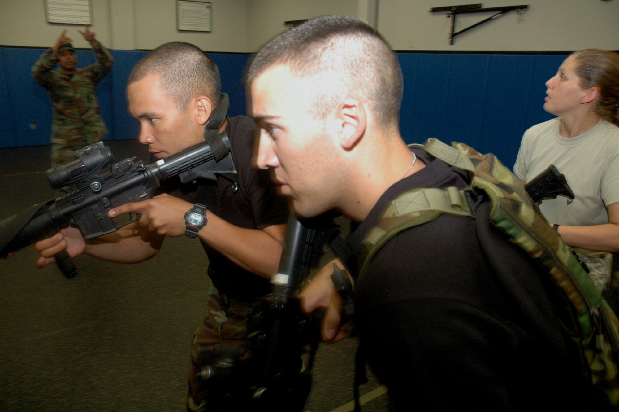 Students in the Air Force Phoenix Warrior Training Course 08-5 practice proper technique for military operations in urban terrain during a "tape drills" class in the U.S. Air Force Expeditionary Center on Fort Dix, N.J., June 5, 2008.  The course is taught by the USAF EC's Expeditionary Operations School and 421st Combat Training Squadron and prepares security forces Airmen for upcoming deployments. Annually, the USAF EC trains more than 23,000 students in expeditionary- and mobility air force-based courses both with in-residence and distance learning.  (U.S. Air Force Photo/Tech. Sgt. Scott T. Sturkol)
