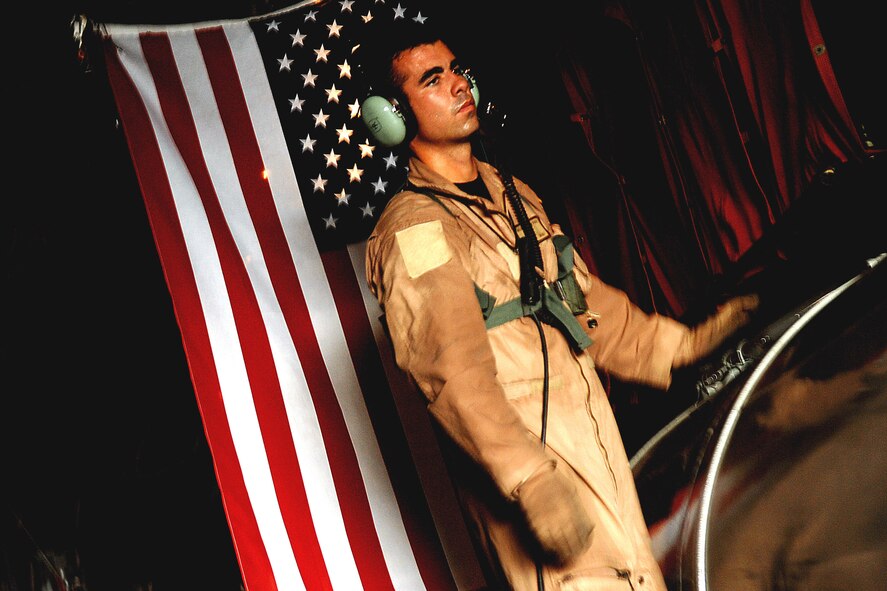 Airman 1st Class Nicholas Greer ties down equipment in the back of an HC-130 Hercules June 3 before taking off on a training mission off the coast of Djibouti. Airman Greer is deployed to Combined Joint Task Force-Horn of Africa out of Camp Lemonier, Djibouti. Airman Greer is a an aircraft loadmaster from the 71st Search and Rescue Squadron and is deployed from Moody Air Force Base, Ga., (U.S. Air Force photo/Tech. Sgt. Jeremy T. Lock) 
