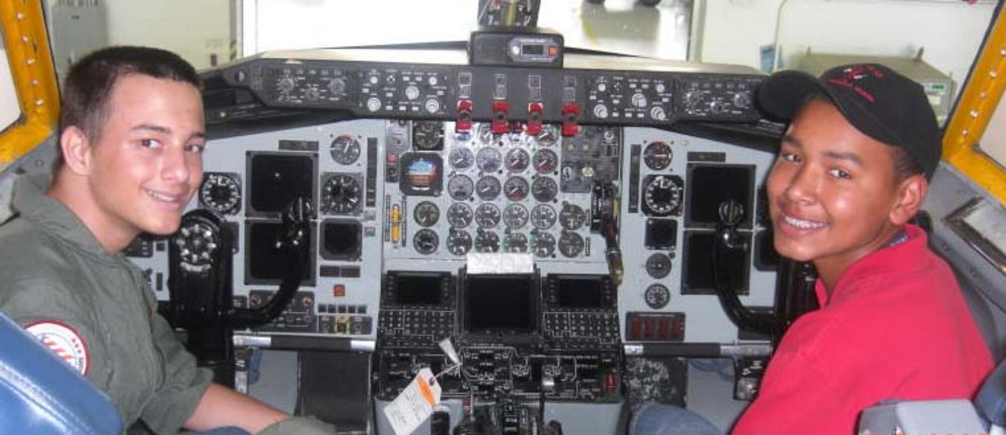 ANDREWS AIR FORCE BASE, Md. -- Zachary Finestone joins his friend Kade McKnight in the cockpit of a KC-135 Stratotanker during Team Andrews's Pilot for a Day program here June 5. Coordinated through the Air Force Reserve Command's 459th Air Refueling Wing and the District of Columbia Air National Guard's 113th Wing, Pilot for a Day or "P4D" is a community outreach program that allows military and civilian children of all ages who suffer from serious or chronic medical conditions to visit an installation for the day to tour wing and base facilities. (U.S. Air Force photo/Maj. Rob Balzano)