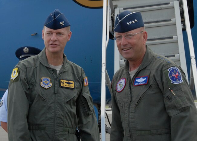 Col. John "Red" Millander greets Gen. Gene Renuart on the Charleston AFB flightline June 12. General Renuart hosted 30 civic leaders from across the United States as they visited joint military operations in the Charleston area. General Renuart is the commander of North American Aerospace Defense Command and U.S. Northern Command and Colonel Millander is the 437th Airlift Wing commander.  (U.S. Air Force photo/Airman 1st Class Cynthia Spalding)