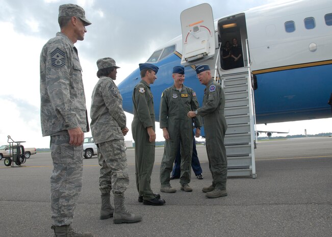 Col. John "Red" Millander and Col. Mark Bauknight greet Gen. Gene Renuart on the Charleston AFB flightline June 12. General Renuart hosted 30 civic leaders from across the United States as they visited joint military operations in the Charleston area. General Renuart is the commander of North American Aerospace Defense Command and U.S. Northern Command; Colonel Millander is the 437th Airlift Wing commander and Colonel Bauknight is the 315th Airlift Wing vice commander.  (U.S. Air Force photo/Airman 1st Class Cynthia Spalding)