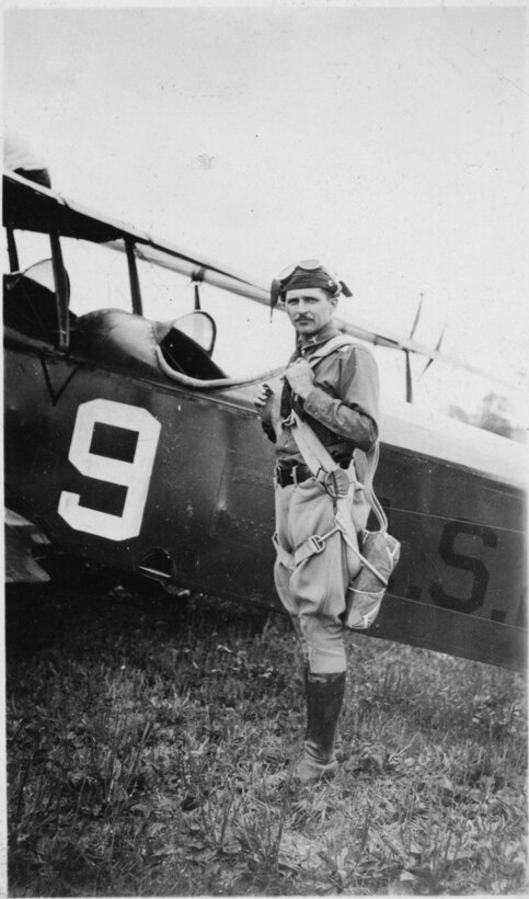 Capt. Charles A. Masson, a pilot with the Maryland National Guard's 104th Observation Squadron, prepares to board his JN-4 "Jenny" aircraft. The Maryland National Guard was equipped with JN-4s from 1921 to 1927.