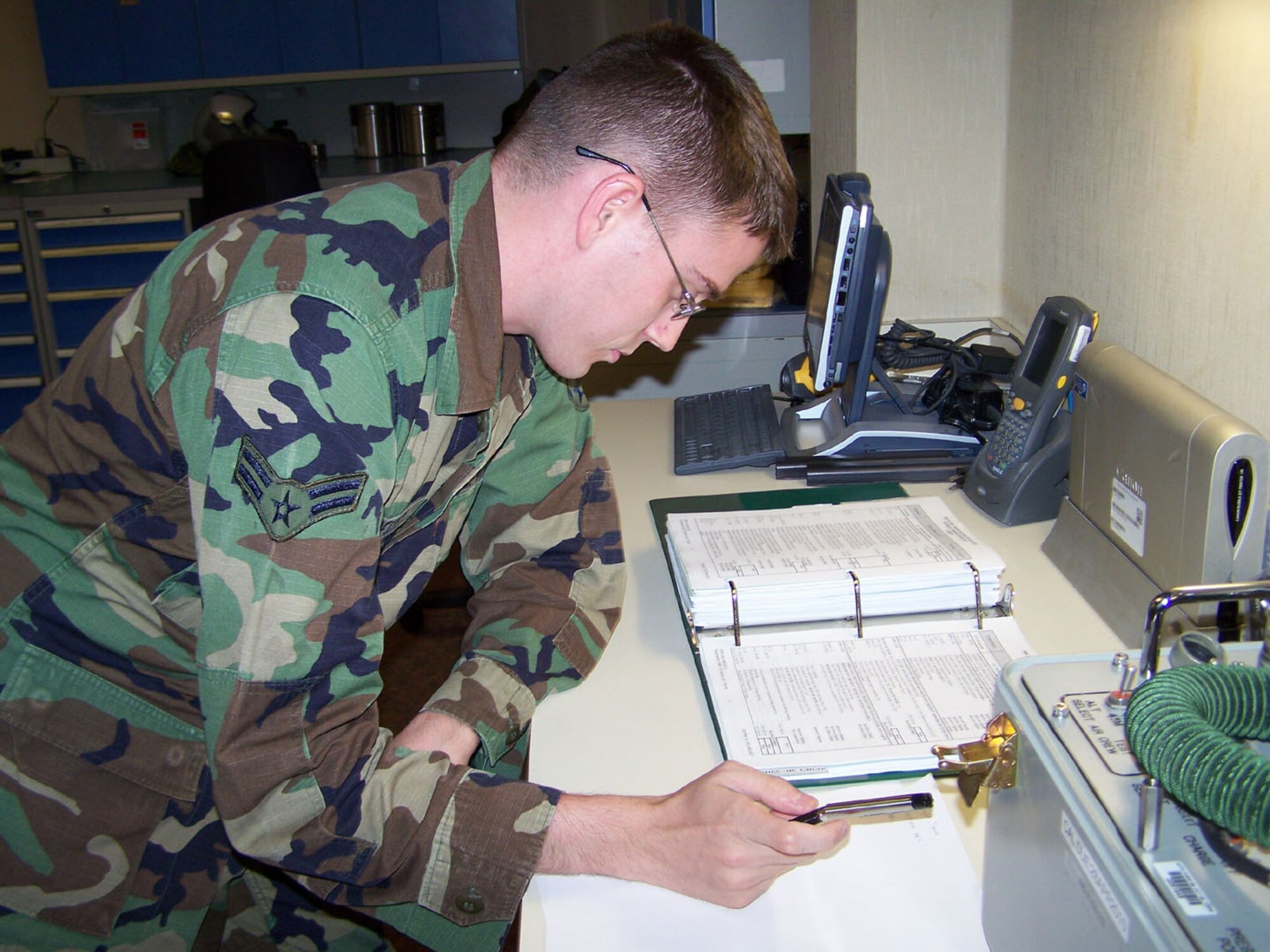 SEYMOUR JOHNSON AIR FORCE BASE, N.C. -- Airman Cody Presely, an aircrew flight equipment specialist, with the 916th Operations Support Flight reviews a technical order during the recent wing training assembly weekend. Airman Presely is a new member of the Reserve-tanker wing. U.S. Air Force photo/TSgt. Ian Gardner