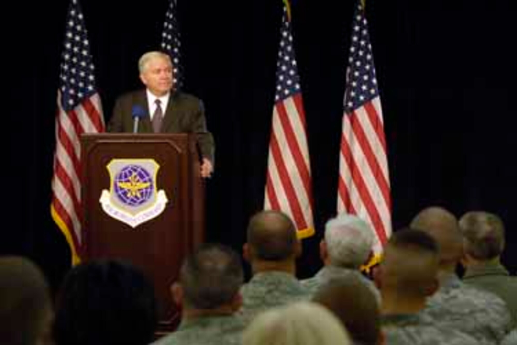 Defense Secretary Robert M. Gates speaks to Air Mobility Command Airmen on Scott Air Force Base, Ill., June 10.  Gates is reassuring the Airmen that they are part of the premier Air Force in the world and discussing the recent resignations of top Air Force officials.  (Defense Dept. photo by U.S. Air Force Tech. Sgt. Jerry Morrison)