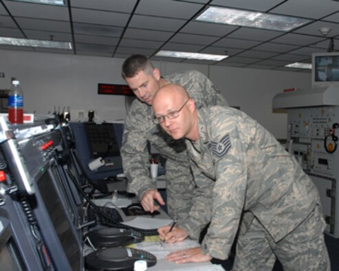 Whiteman Command Post members monitor an ongoing exercise scenario. (U.S. Air Force photo/Tech. Sgt. Samuel Park)