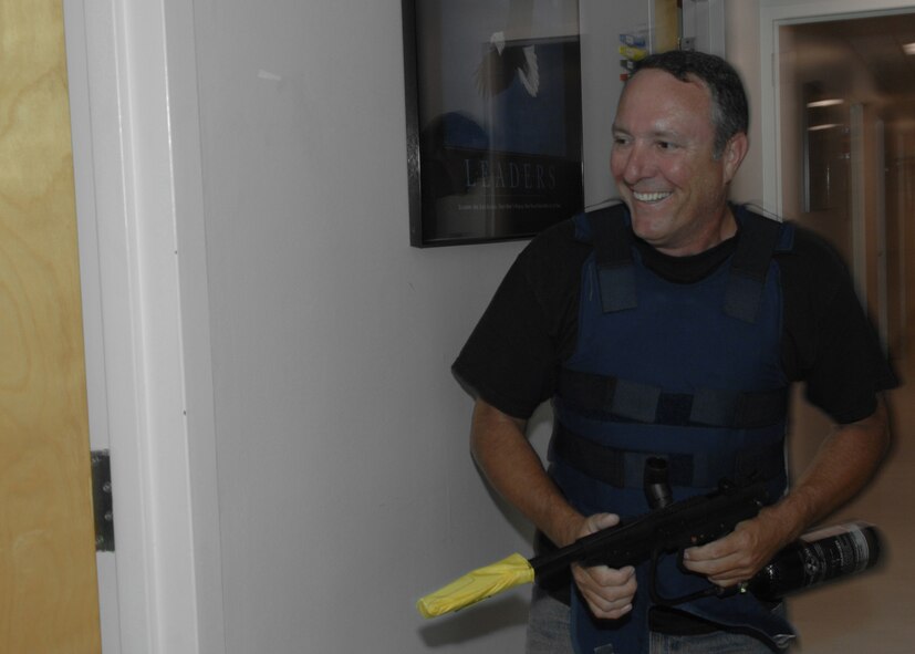 Master Sergeant Randall Hodges, of the 4th Air Medical and Dental Squadron, plays the role of a gunman, who goes on a shooting rampage through the Medical and Dental buildings on Seymour Johnson Air Force Base on the 11th of June, 2008. This was part of a training exercise to see how well the medical providers could respond to a possible gunman terrorizing our medical buildings. (United States Air Force Photograph by A1C Rae Henline)(Not Released)