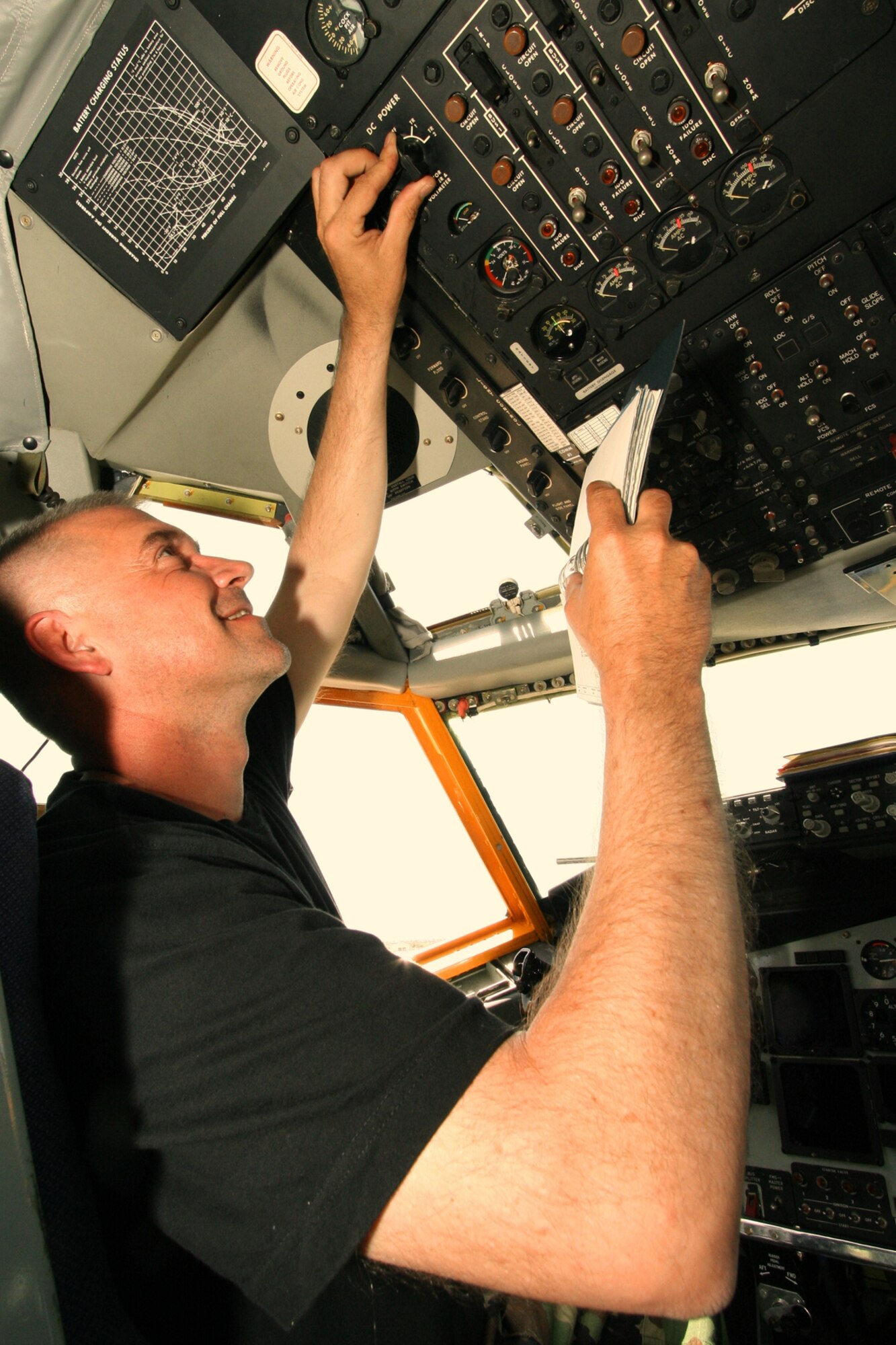 INCIRLIK, AIR BASE, TURKEY --  Tech. Sgt. Brian Achenback, a crew chief with the 434th Aircraft Maintenance Squadron, completes a pre-flight cockpit check as he readies his aircraft to fly on a refueling mission. Airmen from Grissom are providing refueling support to aircraft going in, and out of Northern Iraq and Afghanistan as part of a deployment to Turkey. (U.S. Air Force photo/Tech. Sgt. Patrick Kuminecz)