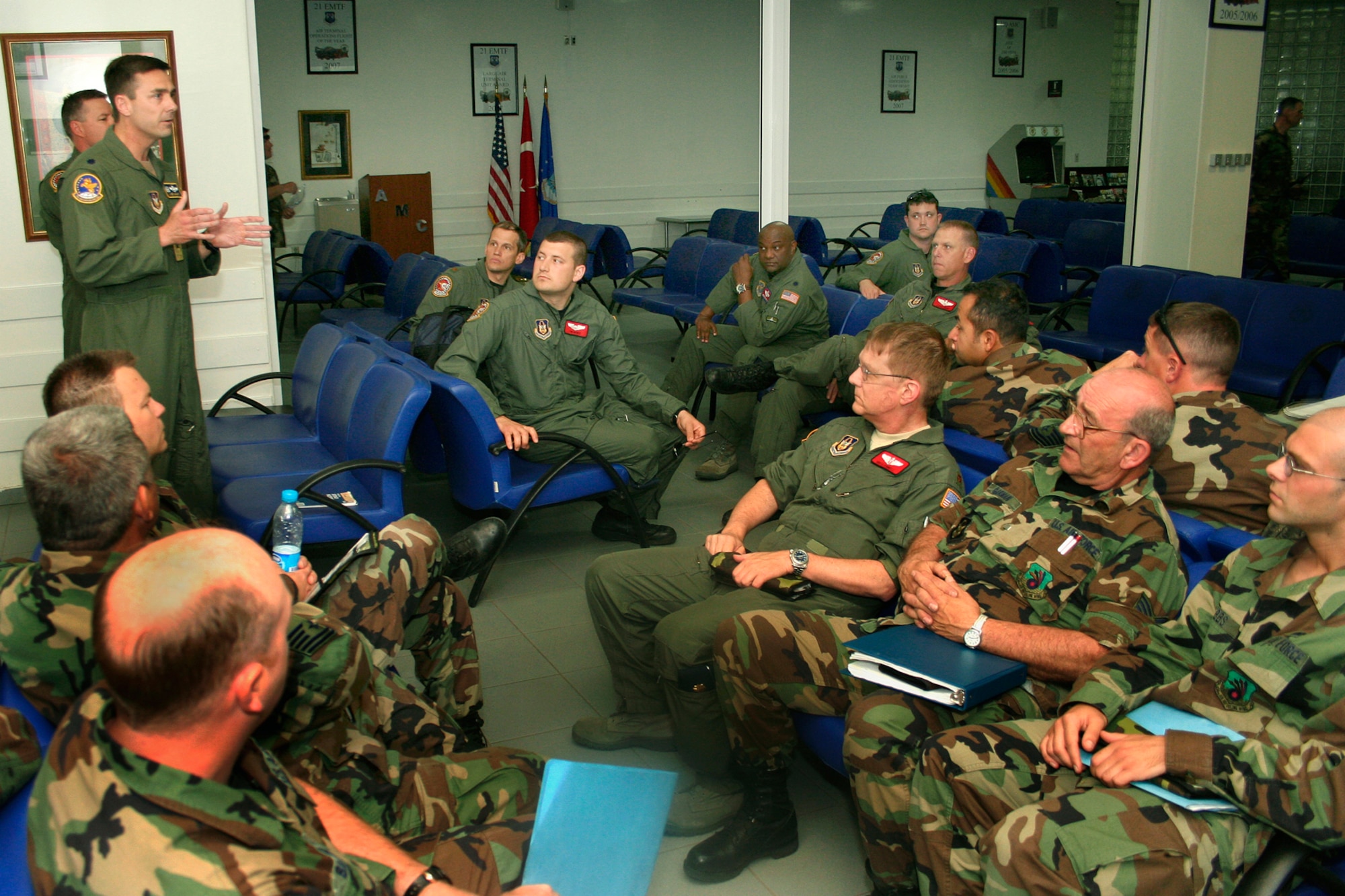 INCIRLIK AIR BASE, TURKEY-- Lt. Col. Laen August, 72nd Air Refueling Squadron commander, briefs arriving 434th Air Refueling Wing members at Incirlik, AB, Turkey. The 434th ARW is deployed and providing aerial refueling support to aircraft going in and out of Northern Iraq and Afghanistan. (U.S. Air Force Photo/Tech. Sgt. Patrick Kuminecz)