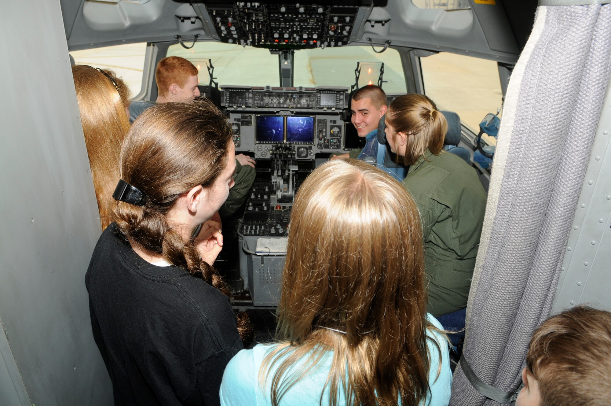 Students from Upper Elementary School in North Hanover look inside the cockpit of a McGuire C-17 Globemaster III. The sixth grade students took part in a mobility line that culminated with a simulated trip to “Camp Camel”. The field trip gave the students a perspective of the troops that deploy for contingencies. (U.S. Air Force photo/Kenn Mann)