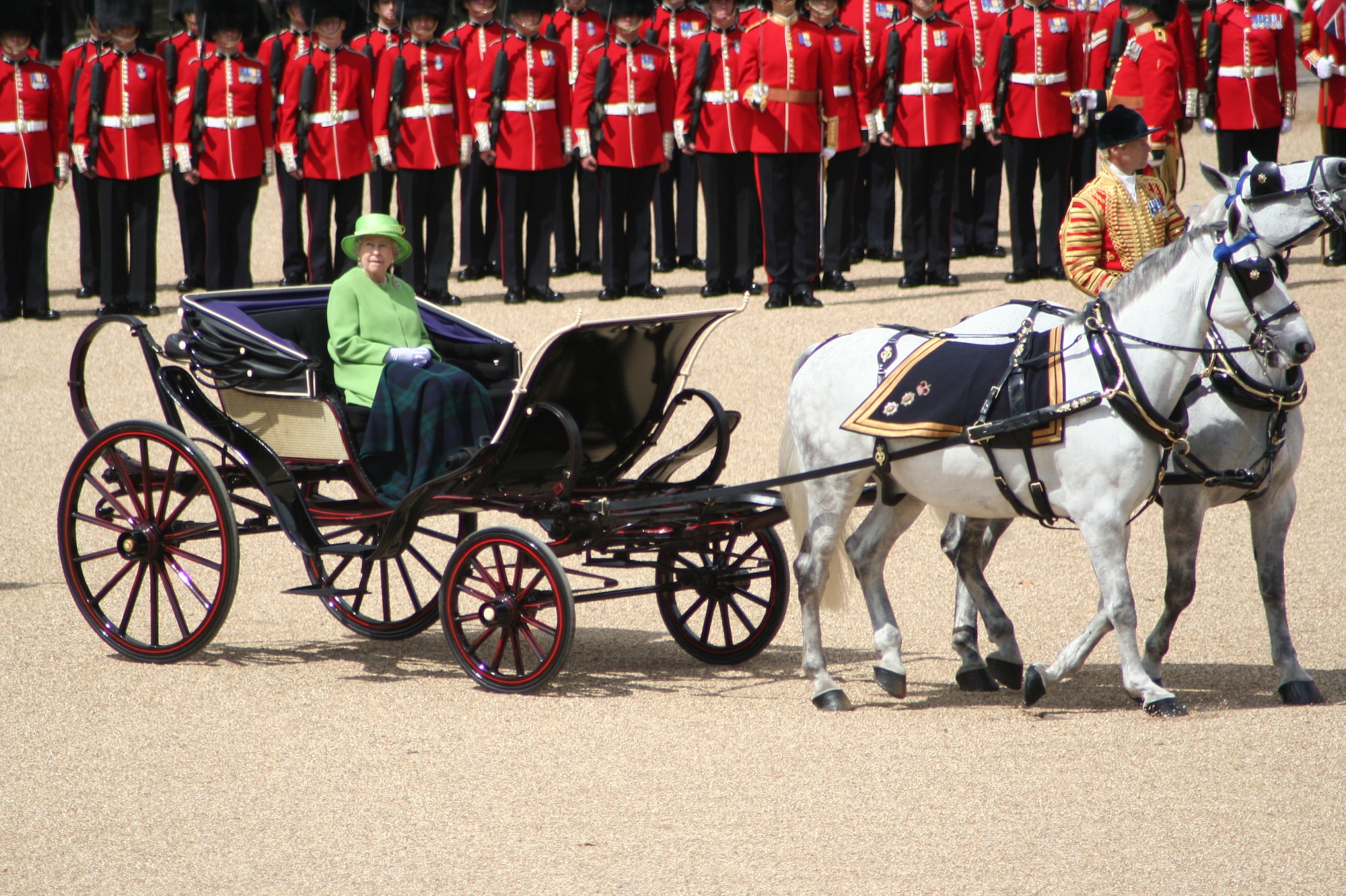 The Queen inspects her Guards in Queen Victoria's ivory-mounted phaeton of 1842. (courtesy photo)