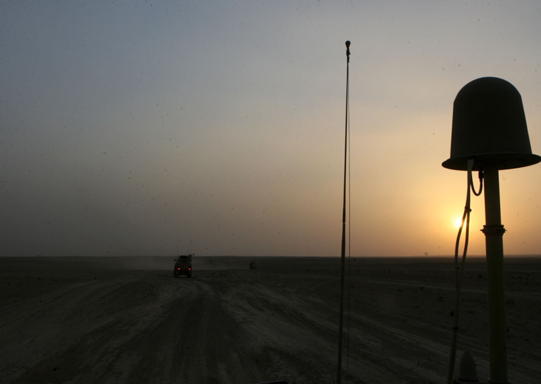 Route Clearance Platoon, 3rd Combat Engineer Battalion, Regimental Combat Team 5, travels down one of the many roads that fall under RCT-5's area of operations western Al Anbar province, Iraq, June 12. Route Clearance Platoon travels throughout the province to find and clear improvised explosive devices in order to make the roadways safer for Coalition forces and the Iraqi people. The platoon also aids the infantry battalions with patrols and escort convoys as they travel the roads of Iraq.
