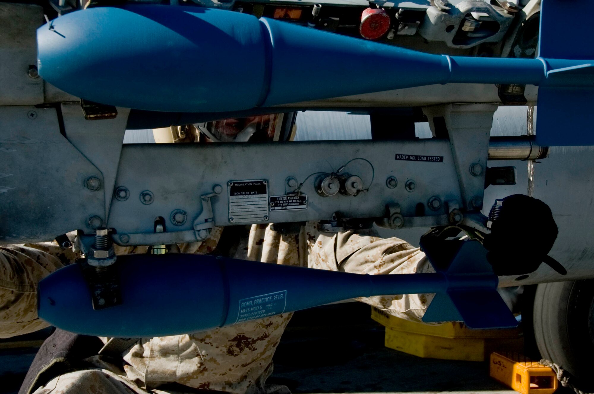 EIELSON AIR FORCE BASE, Alaska -- Lance Cpl. Sterrett loads explosive ordinance onto an F-18 Hornet June 13, 2008. The Marines deployed from Miramar are participating in RED FLAG-Alaska 08-3 a series of Pacific Air Forces commander-directed field training exercises for U.S. forces, provides joint offensive counter-air, interdiction, close air support, and large force employment training in a simulated combat environment. (U.S. Air Force photo by Airman 1st Class Christopher Griffin)