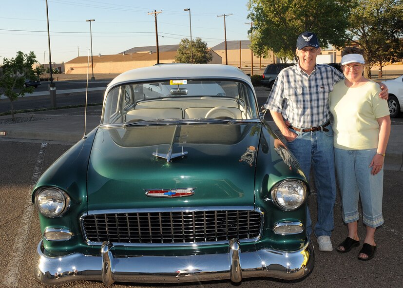 Community Readiness Consultant retired Chief Master Sgt.  Charlie Tallman and his wife Synthia show off their 1955 Chevorlet at the Airman and Family Readiness Center on Holloman Air Force Base,  N.M. Wednesday, June 11. The Airman and Family Readiness Center put on a car show in promotion of their Families Apart Dinner. (U.S Air Force photo/ Airman 1st Class Deandre Curtiss)  