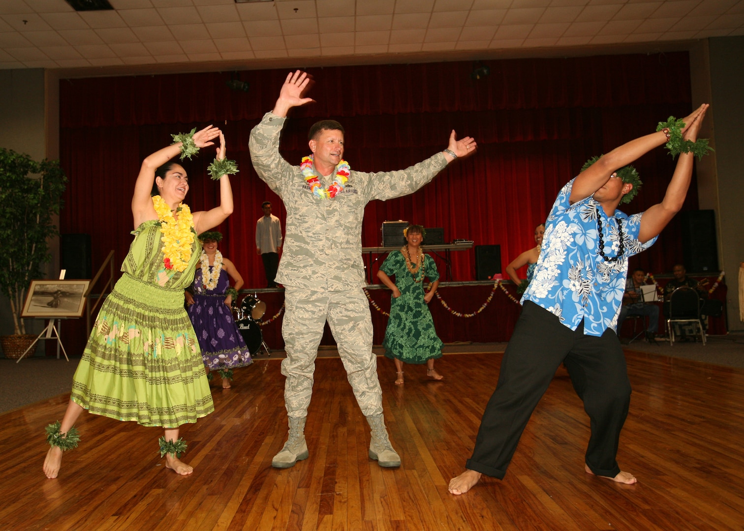 5/27/2008 - Brig. Gen. Len Patrick, 37th Training Wing commander, joins the fun on the dance floor during the Asian/Pacific Islander food tasting at Arnold Hall May 27.  More than 400 people attended and were treated to Asian/Pacific food including pad thai, lumpia and red rice.  
(USAF photo by Robbin Cresswell)