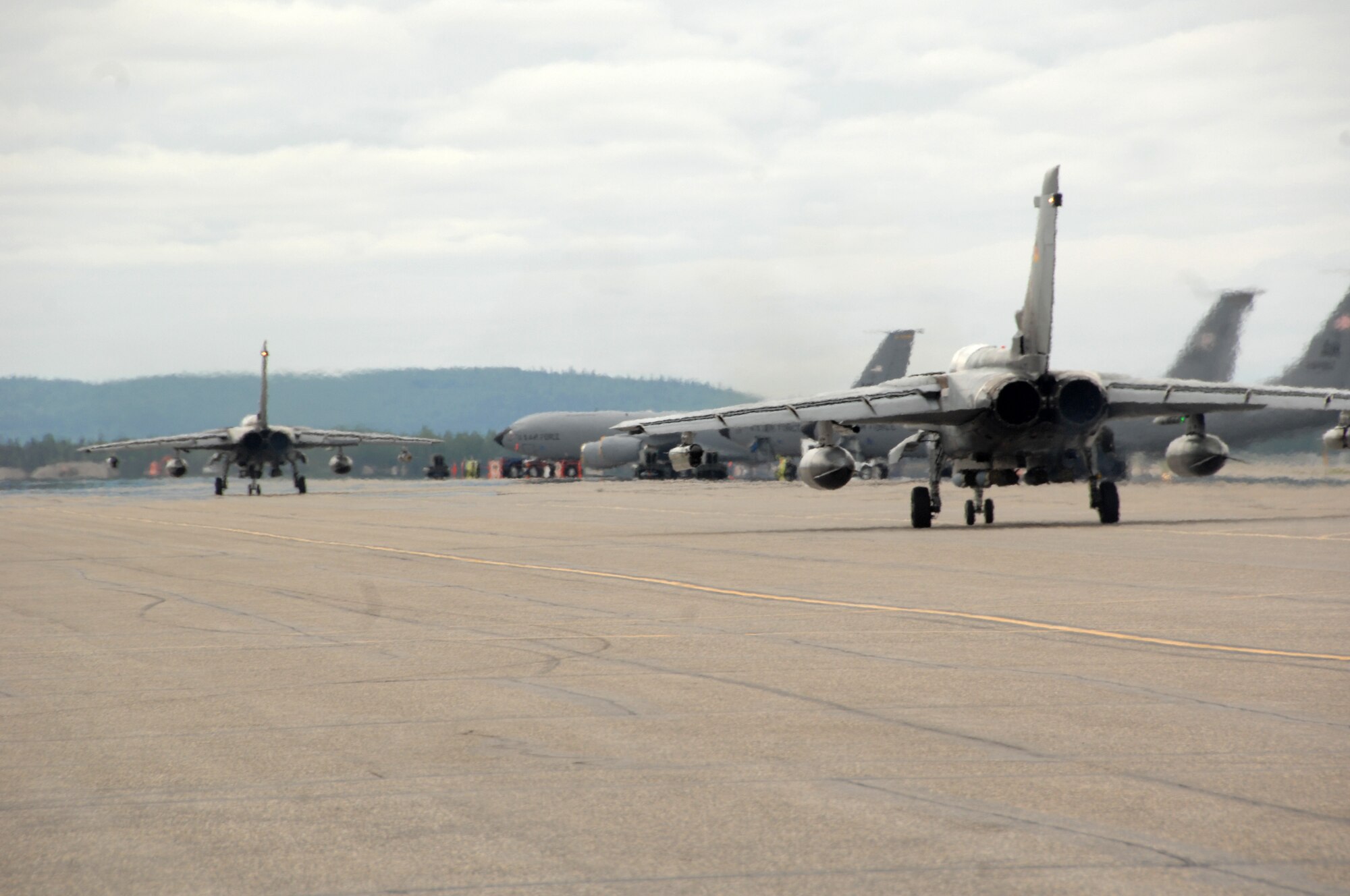 Two German Tornados taxi down the flightline during RED FLAG-Alaska 08-3 June 12, 2008.  The Germans are participating in RF-A 08-3, a 10-day air combat training exercise held up to four times a year over Alaskan and Western Canadian airspace.  (U.S. Air Force photo/Staff Sgt. Tia Schroeder)