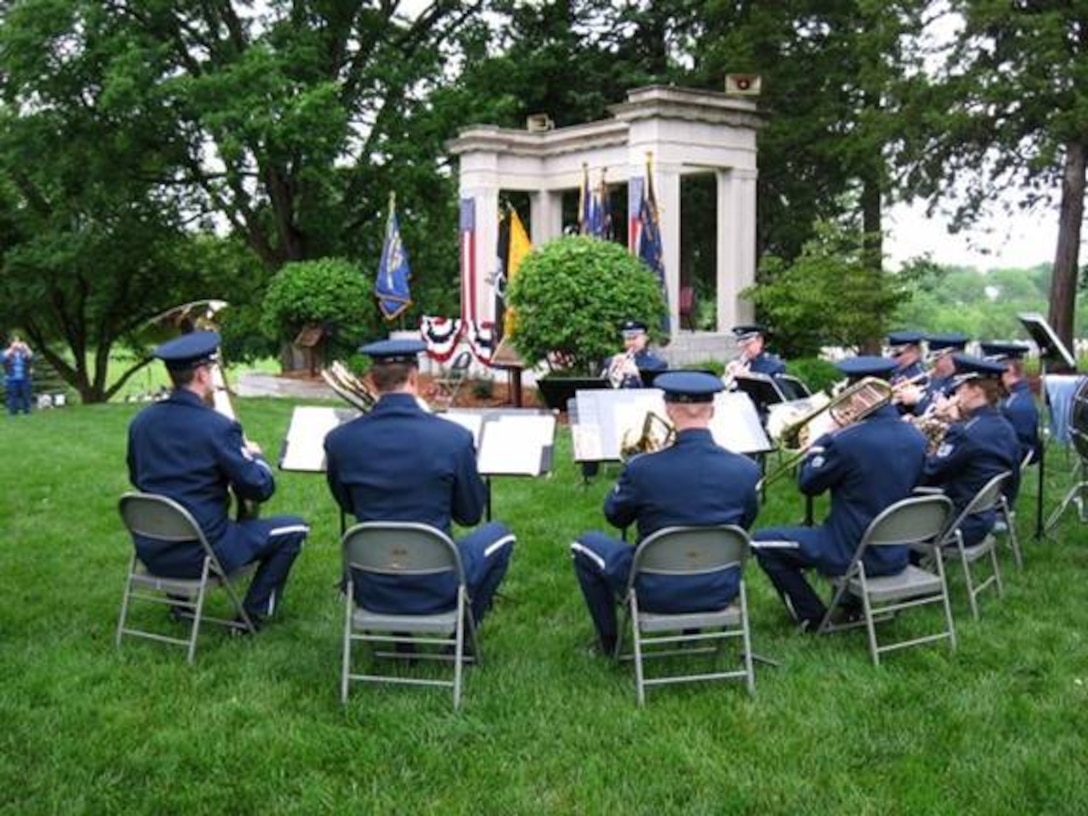 The USAF Heartland of America Band's Brass in Blue performs for a Memorial Day Ceremony at Leavenworth National Cemetery in Kansas.  Though a rainy day, the ceremony went according to schedule and was a touching tribute to veterans who have made the ultimate sacrifice for their country.