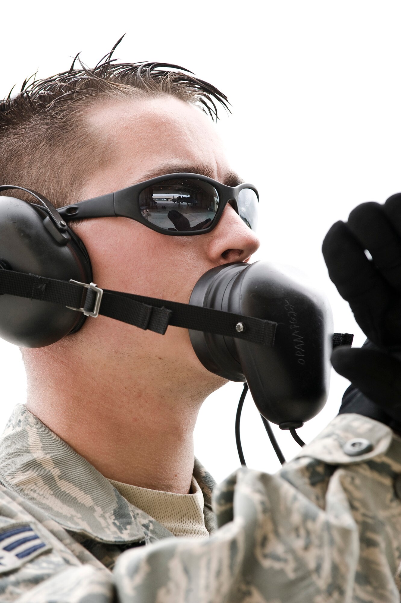 Senior Airman Matthew Nevins marshals an A-10 Thunderbolt II out of a hawg pen June 12, 2008, at Eielson Air Force Base, Alaska during RED FLAG-Alaska 08-3. This a series of Pacific Air Forces commander-directed field training exercises for U.S. forces, provides joint offensive counter-air, interdiction, close air support, and large force employment training in a simulated combat environment. He is assigned to the 51st Aircraft Maintenance Squadron at Osan Air Base, Korea. (U.S. Air Force Photo/Airman 1st Class Jonathan Snyder)