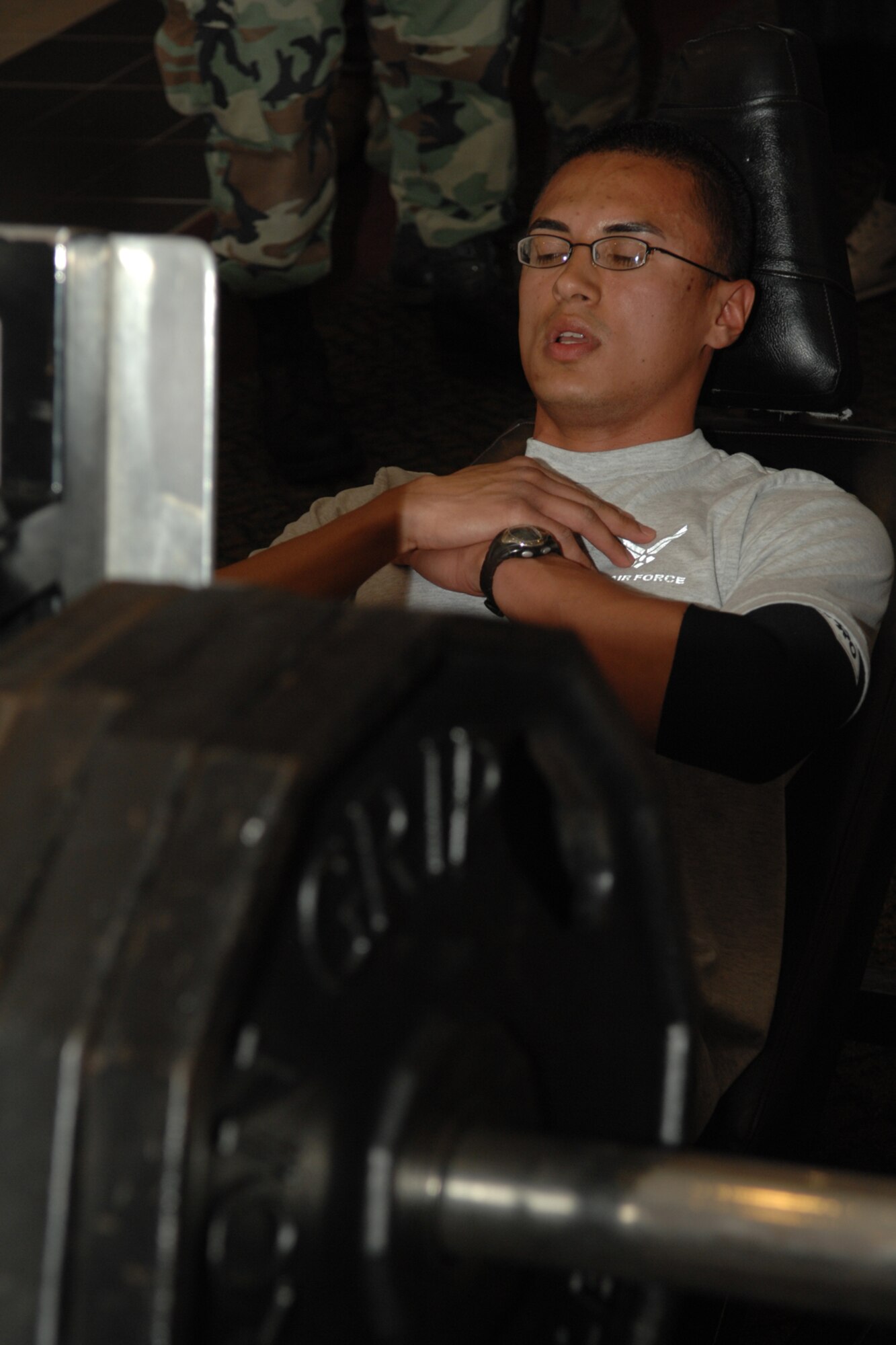Airman 1st Class Emilio Rivas, 49th Medical Support Squadron, performs leg presses during the Team Iron Airman Challenge June 11 at the Fitness and Sports Center at Holloman Air Force Base, N.M. Airman Rivas completed 68 repetitions at 405 pounds. (U.S. Air Force photo/Airman 1st Class Jamal D. Sutter)